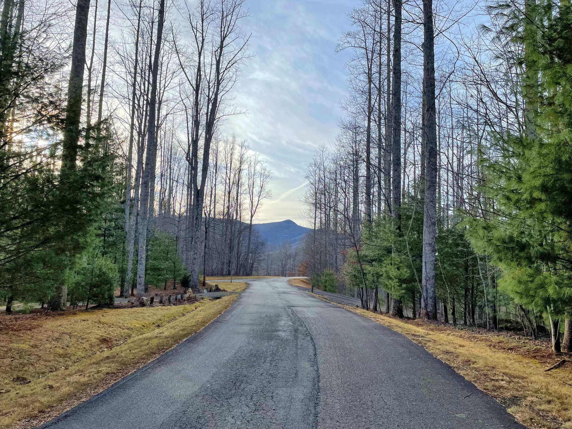 Wide paved roads in the shadow of Phoenix Mountain.