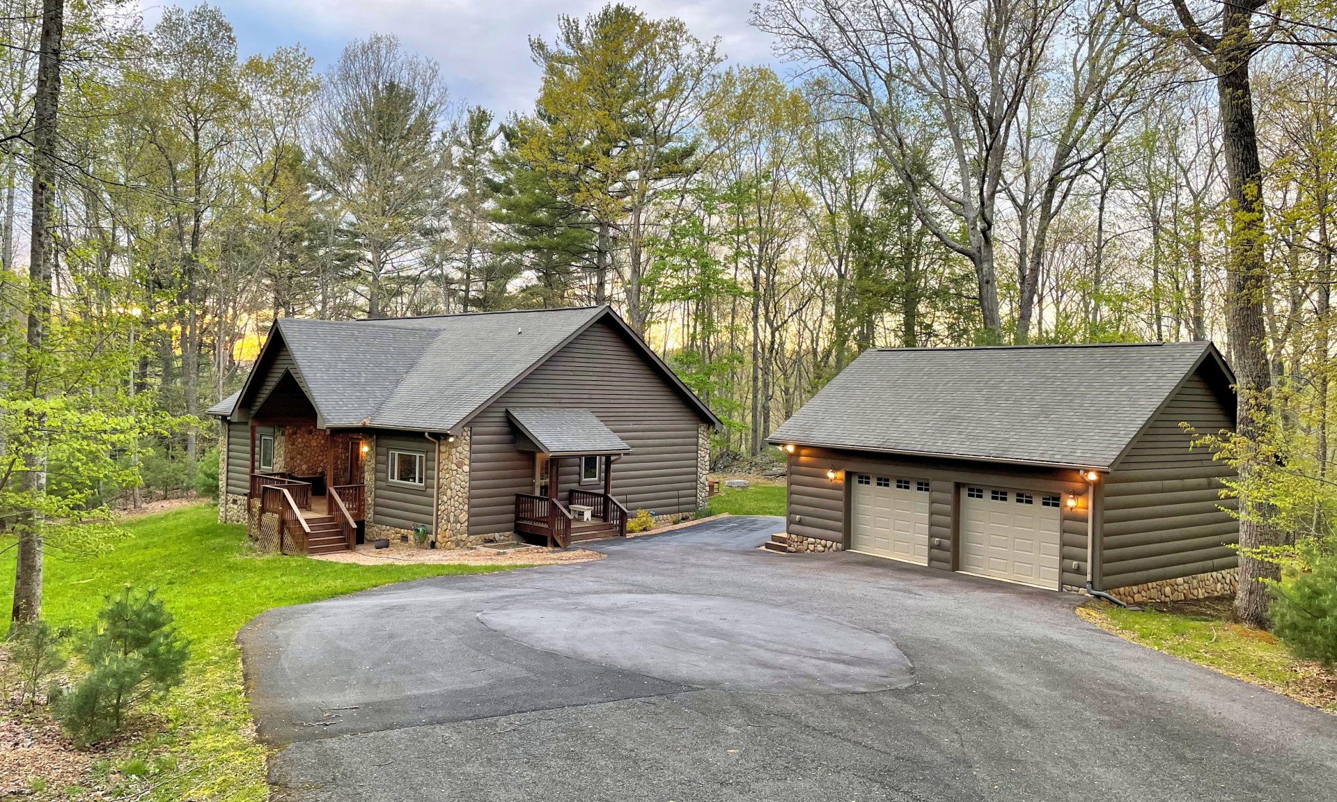 You'll have the privacy you've dreamed of on a wooded lot almost 4 acres in size while enjoying the benefits of a neighborhood with gentle rolling paved roads and well-spaced out homes.
