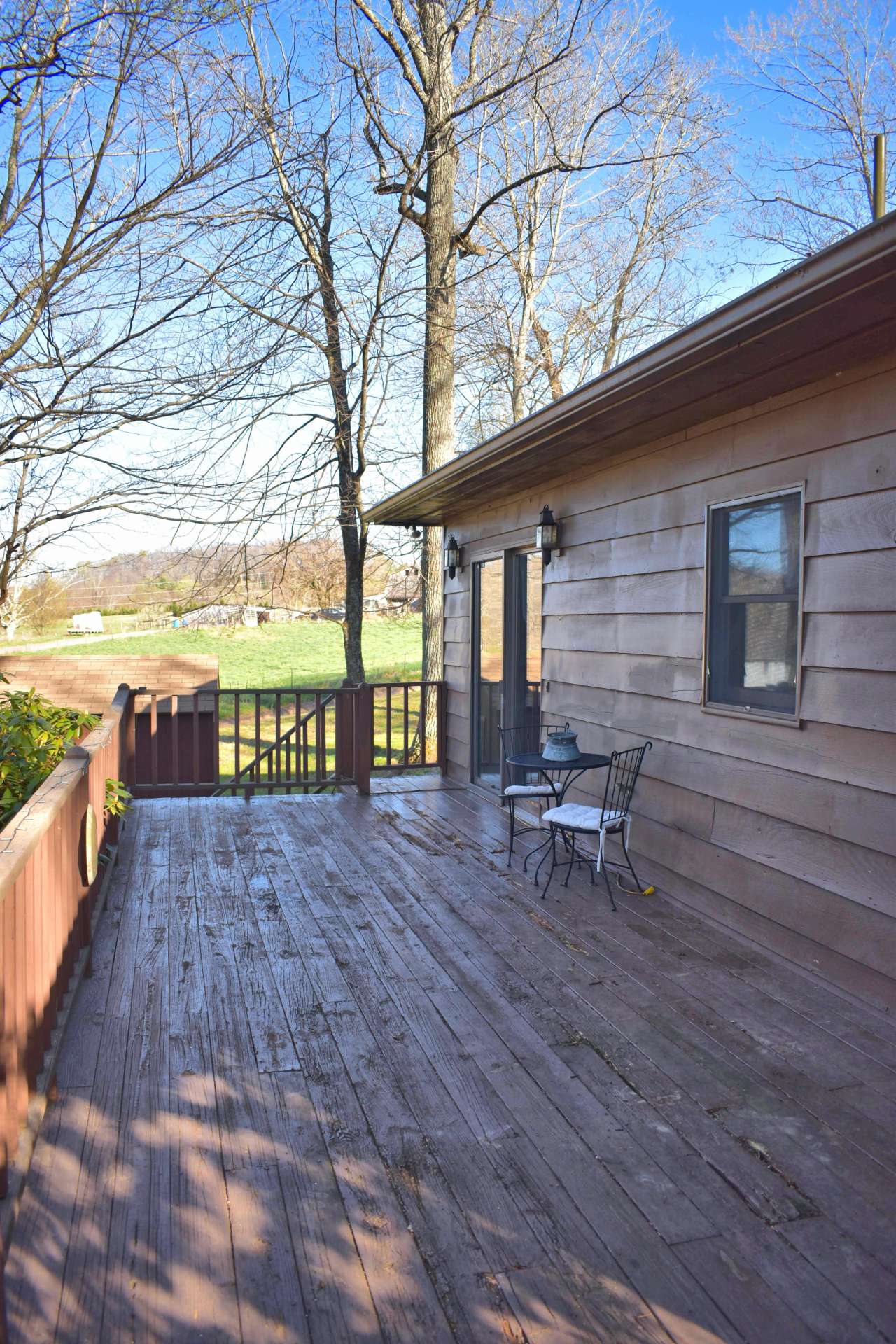 Back deck spans the length of the house.