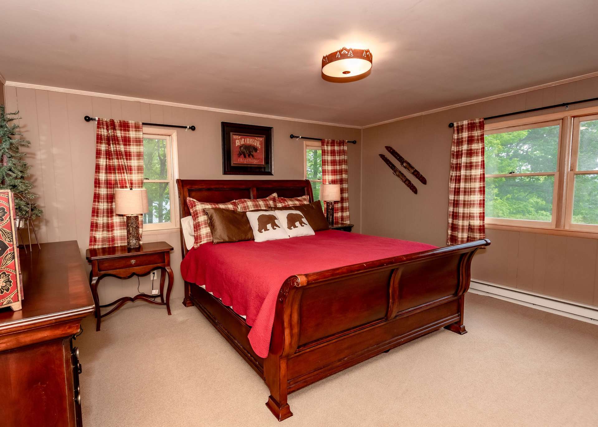 The upper level is also home to the master suite with private bath.