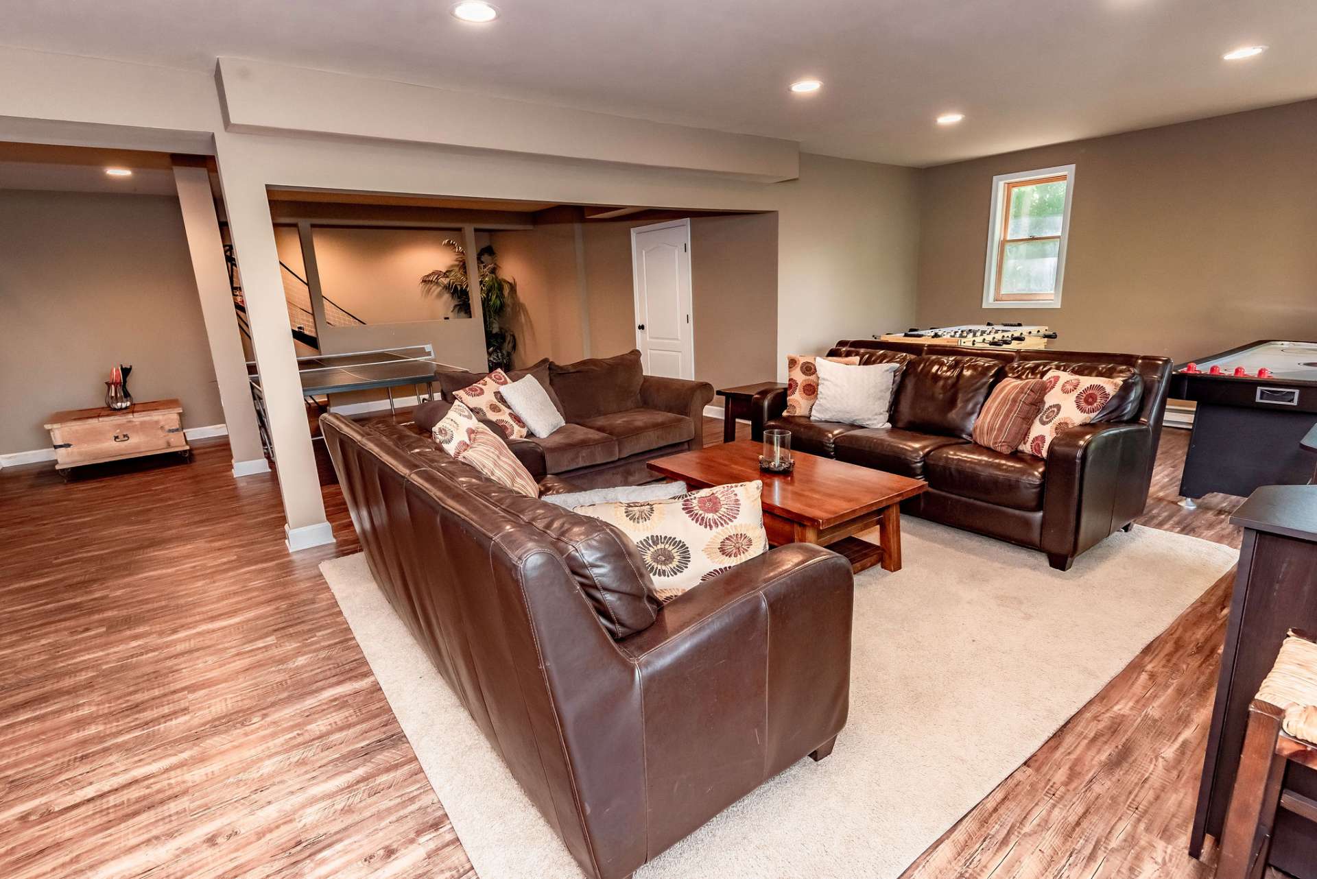 A full finished walk-out lower level features a large living area and game room.