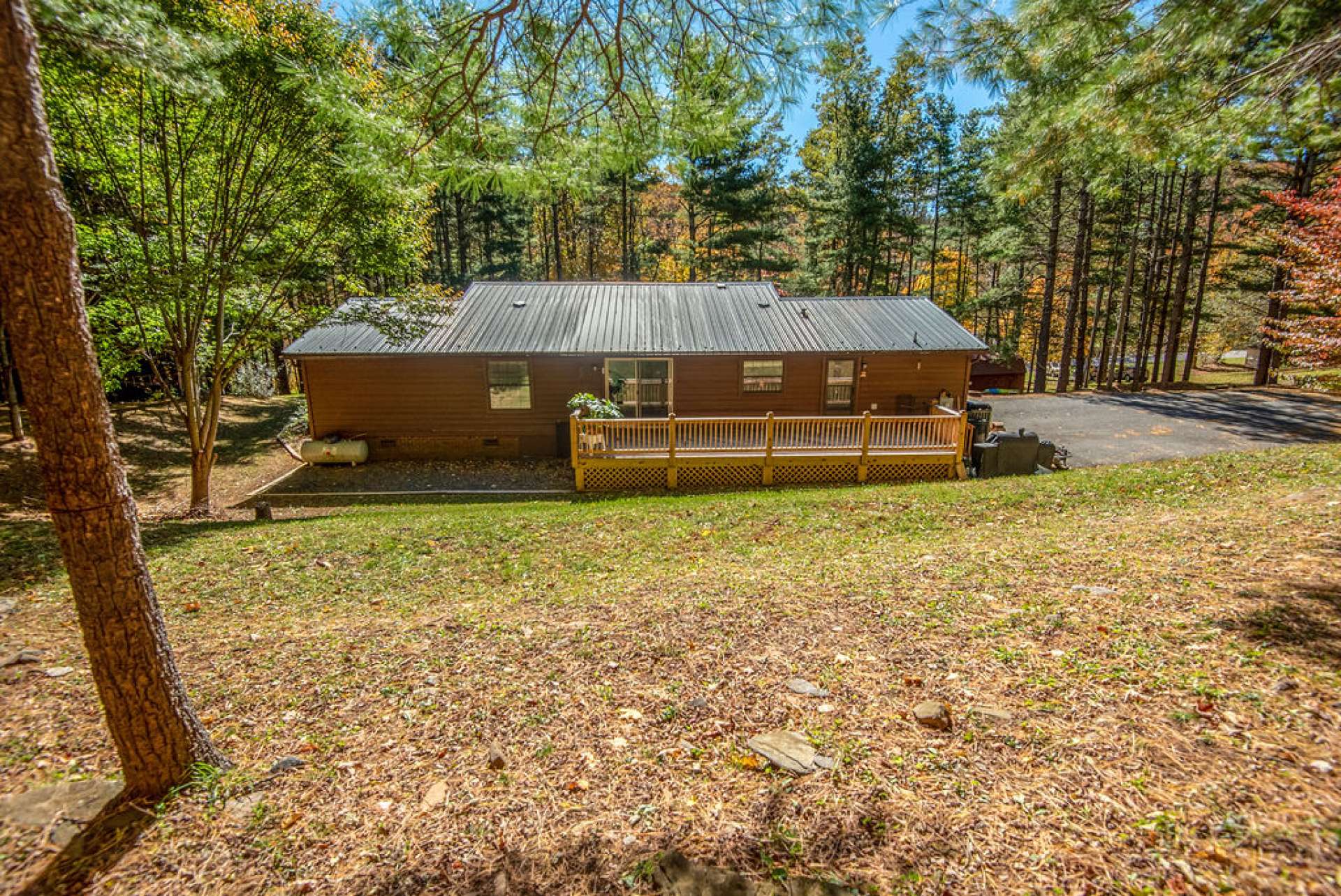 There is a large open back deck for grilling and dining outdoors.