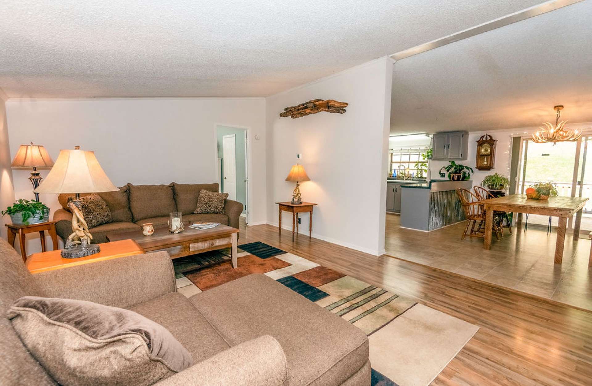 An inviting living area welcomes you with a bright cheery open concept floor plan and lots of windows for lots of light.