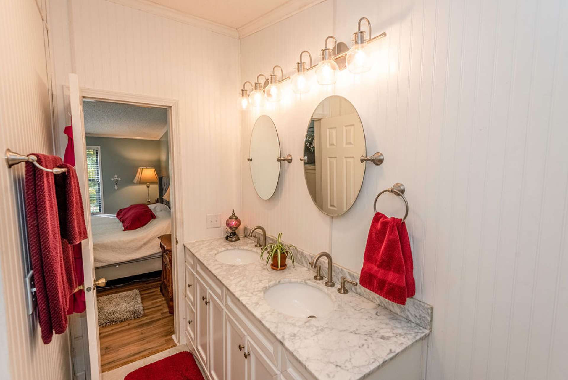 The master bath features a double vanity and a walk-in shower.