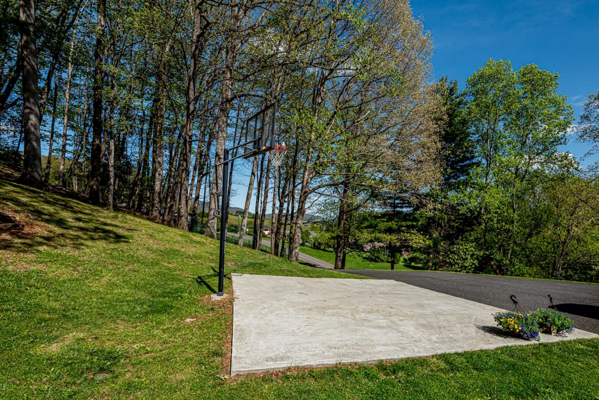 The back yard offers a great place for outdoor sports and entertaining.
