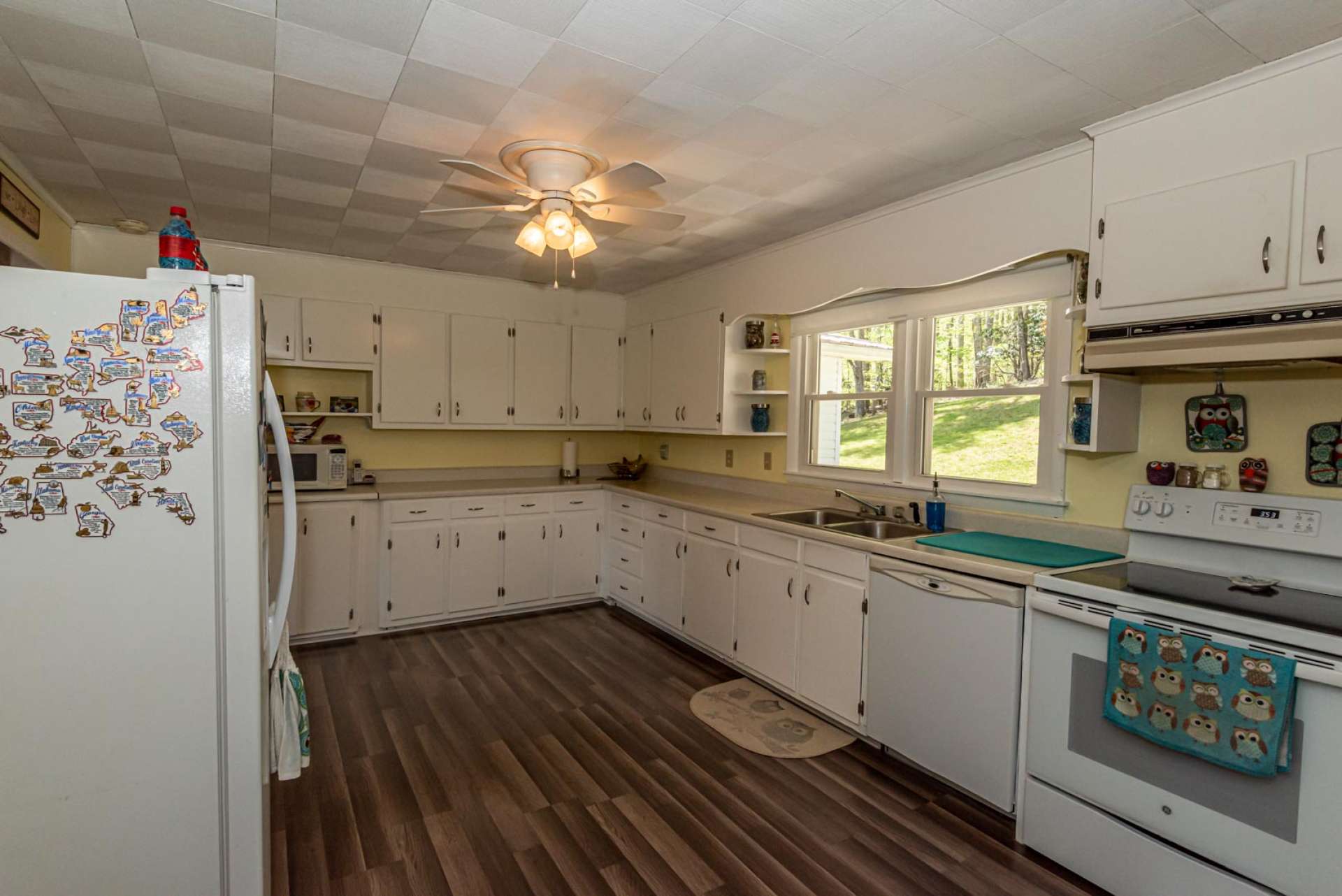 There is plenty of work and storage space in this spacious country kitchen.