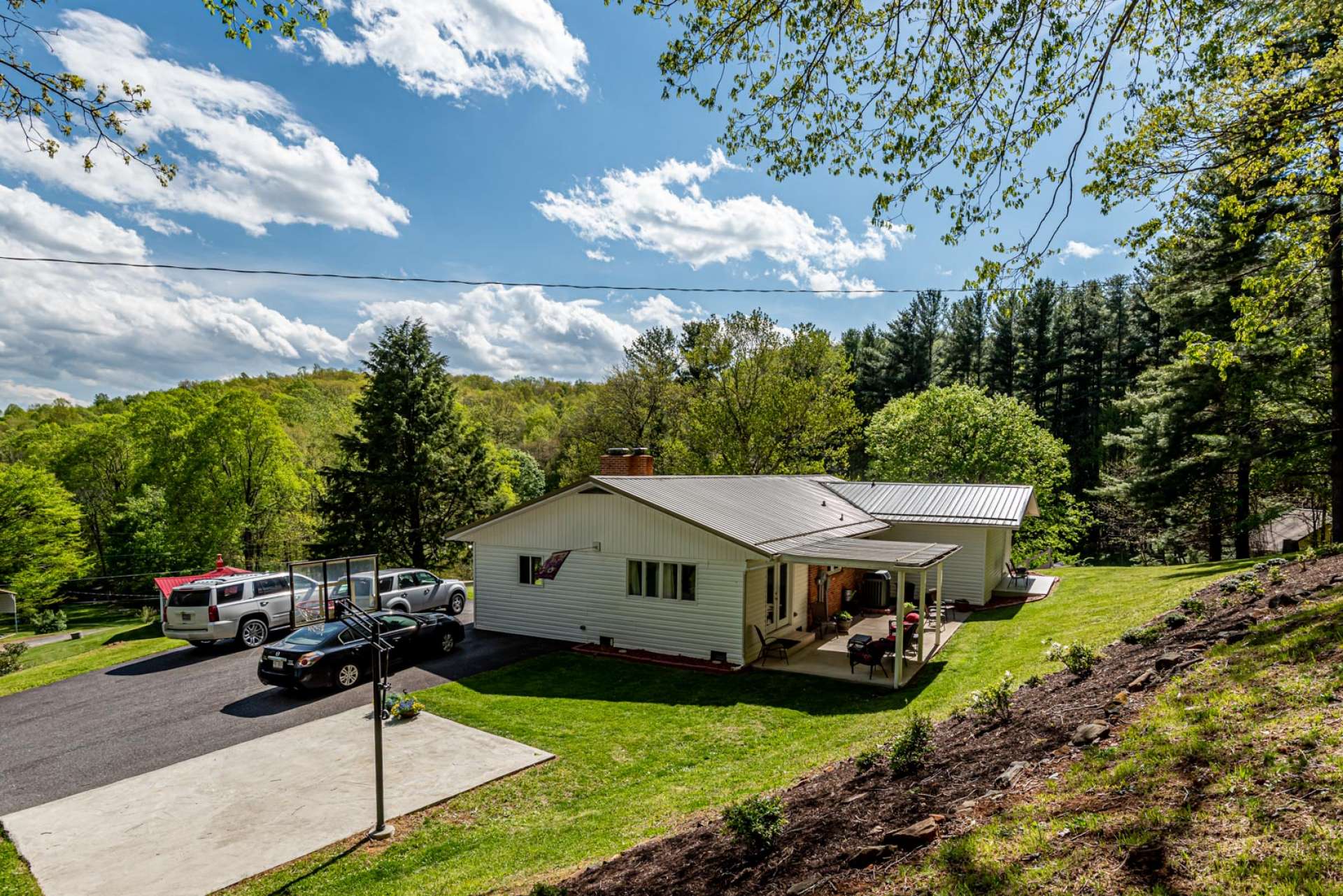 This sweet mountain home is an ideal option for your primary home, cool mountain retreat, or investment property.  The location is convenient to downtown West Jefferson, Boone, and many of the NC High Country destinations.