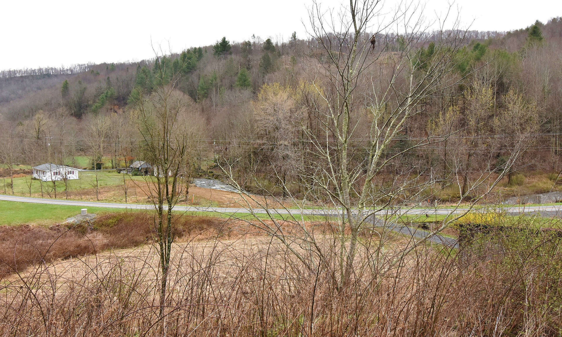 NC Mountain land overlooking Big Horse Creek in the Lansing area of Ashe County in the  North Carolina high country.   If you are looking for a mountain acreage tract to construct your mountain cabin or forever home, come take a look at this 45+ acre tract.