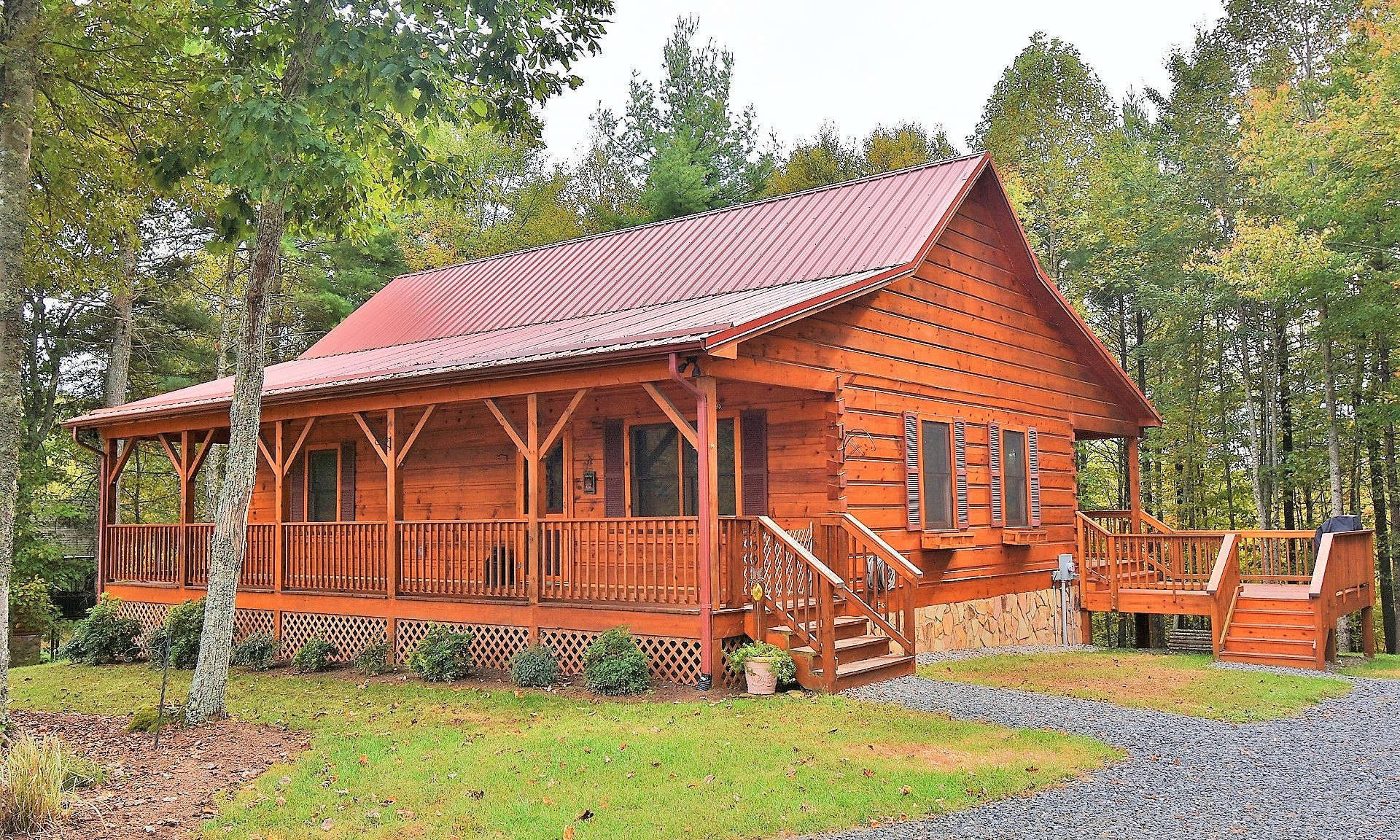 ESCAPE TO THE COOLEST CORNER OF NC! Resting on a 1.58 acre setting surrounded by woodlands in Painted Laurel, a well established community in the Jefferson area of Ashe County, this immaculate 2-bedroom, 2-bath log cabin is the ideal choice for your NC High Country mountain cabin.