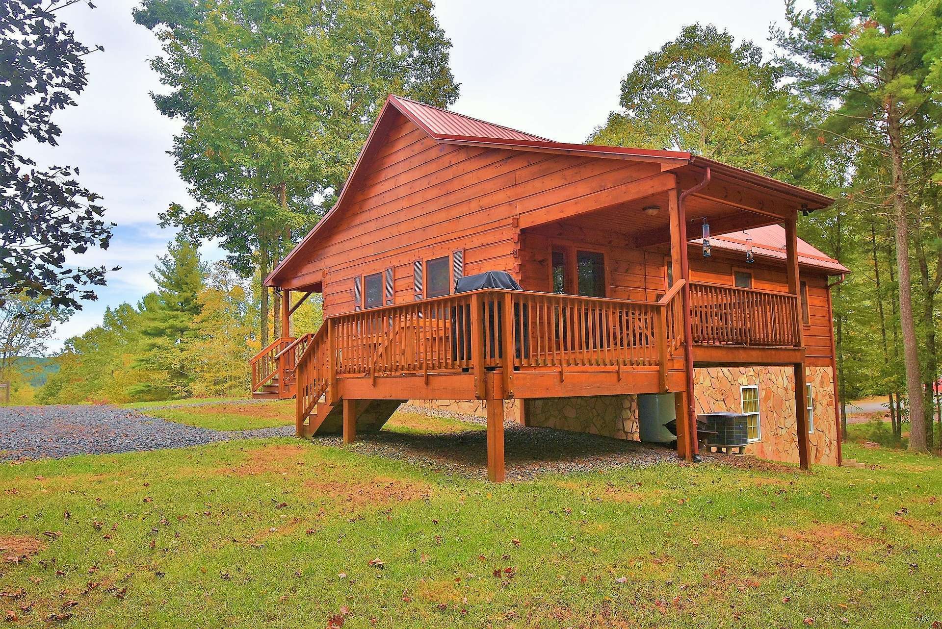 The cabin is nicely sited on the lot and offers plenty of room for landscaping, gardening, and play.