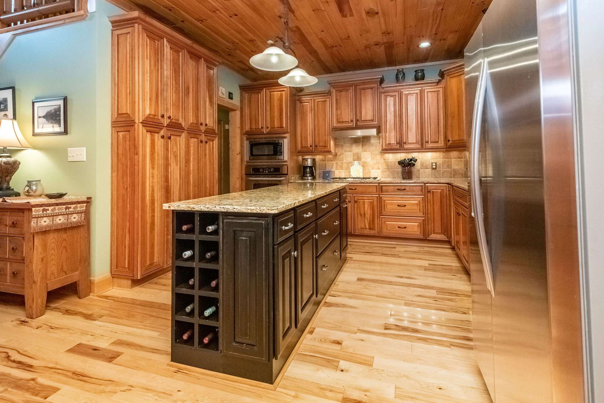 You'll love this accent island offering additional storage and wine rack.