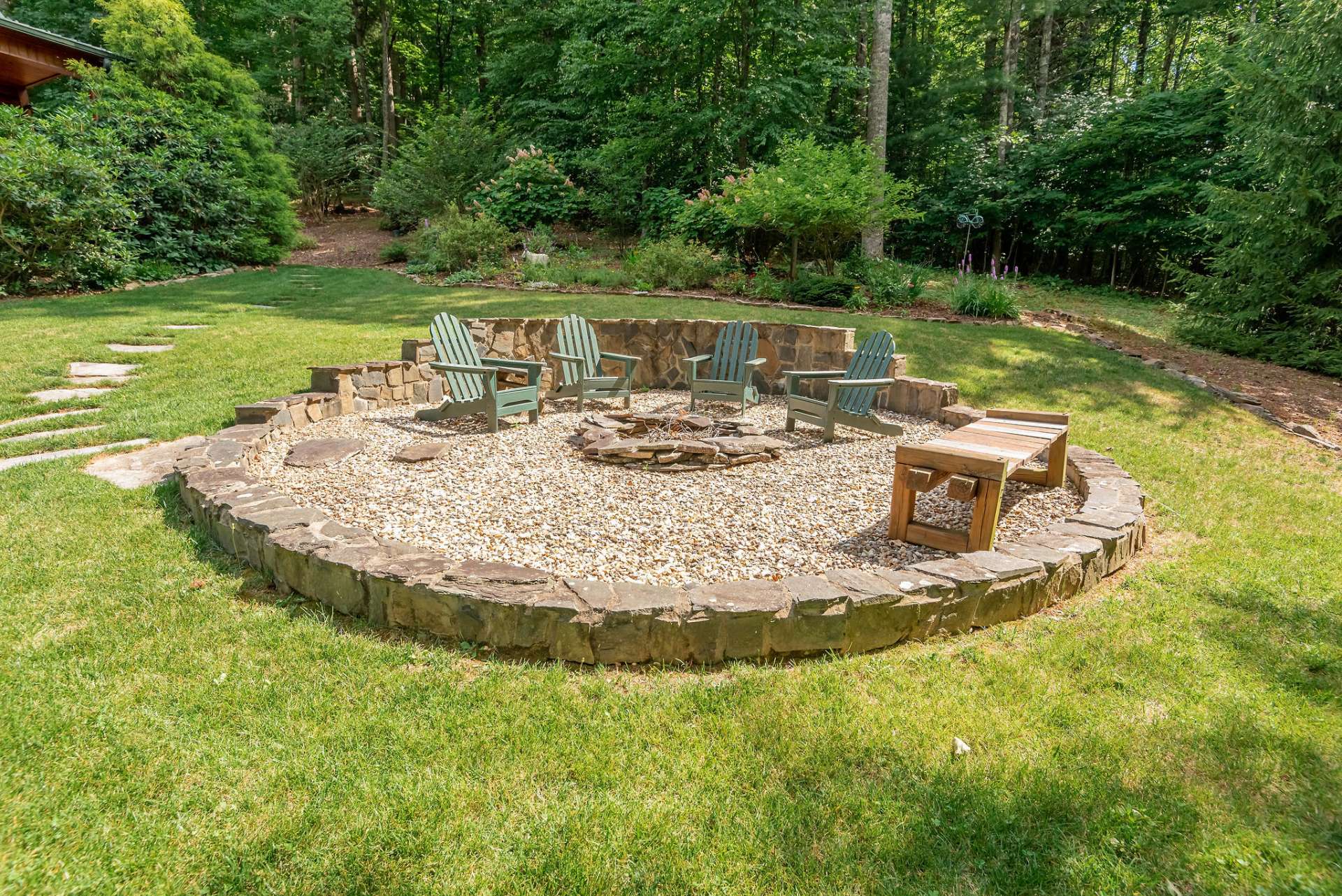 You'll never tire of sitting around the fire and roasting marshmallows on this large fire pit out front.