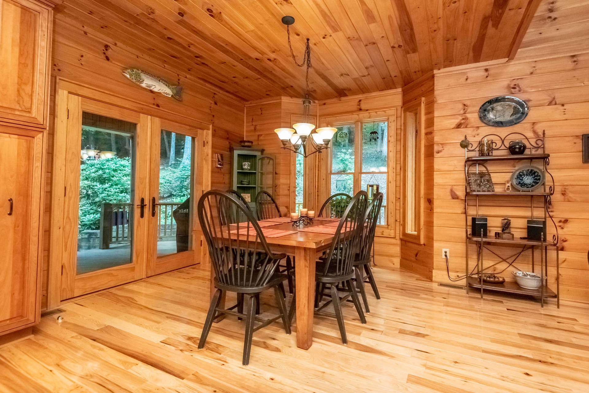 Dining area opens to the spacious covered back deck.