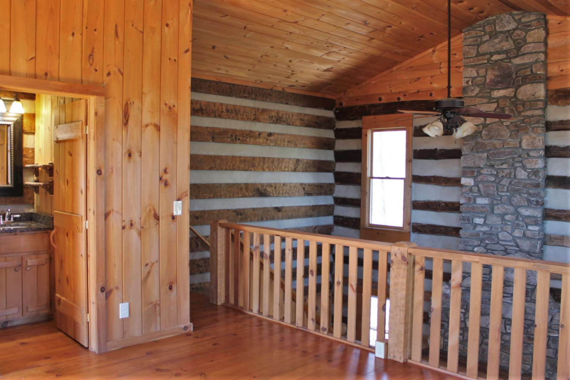 This loft bedroom provides guests a wonderful place to rest their head after a day of playing in the mountains.