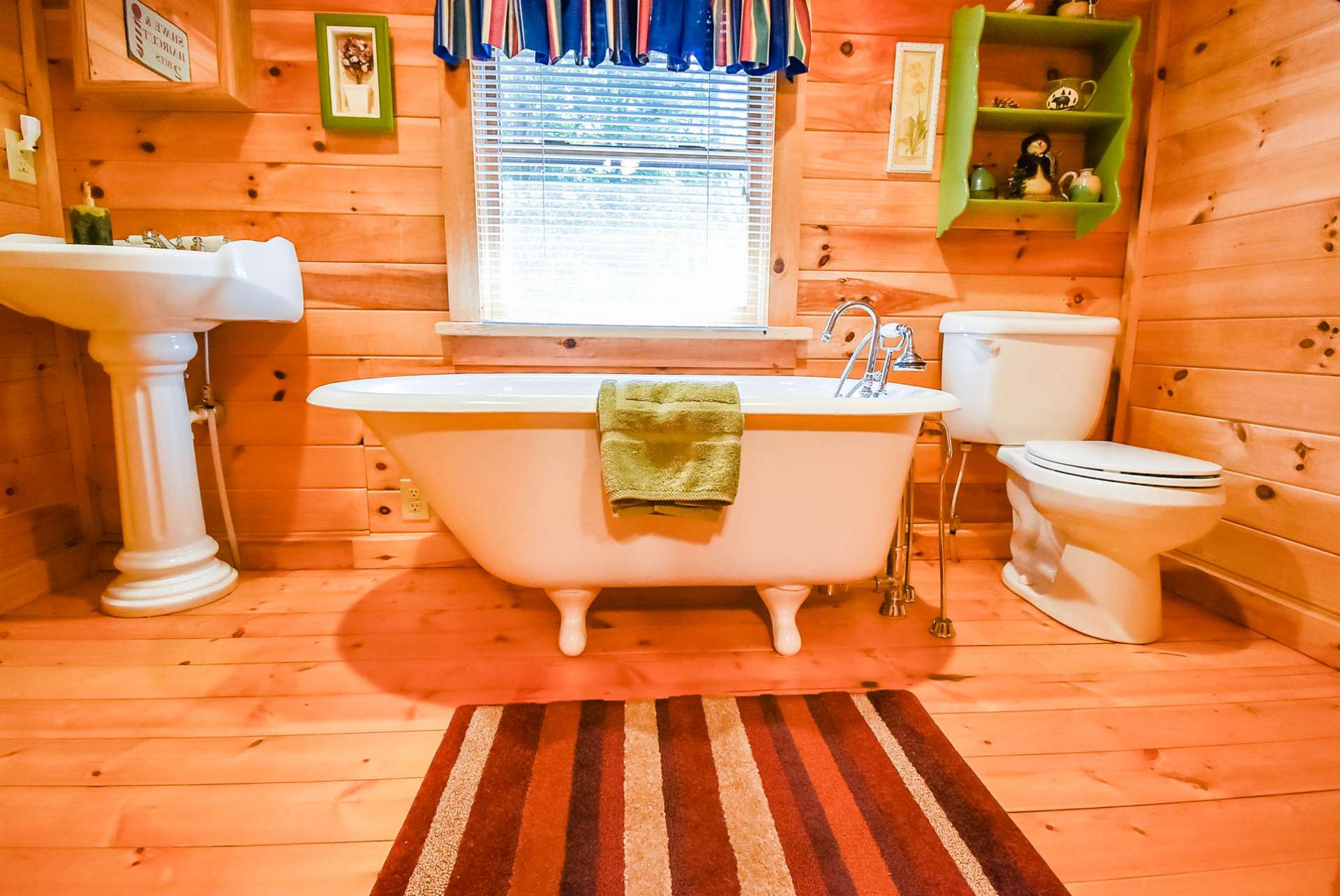 You will love the refurbished 1920s tub in the master bath adding even more charm to this cabin.