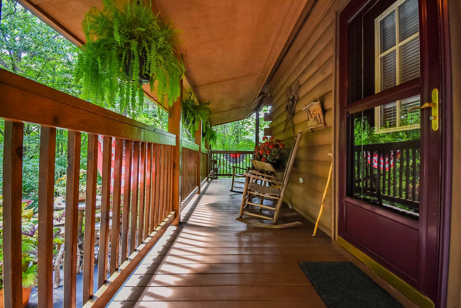 The covered wrap around porch welcomes you home to your  North Carolina Mountain retreat.