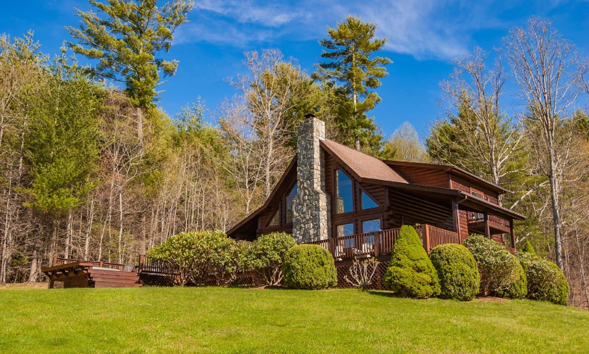 Come see this true log cabin with breathtaking panoramic views of Phoenix Mountain! This 3-bedroom, 2-bath log cabin offers three levels of living space.