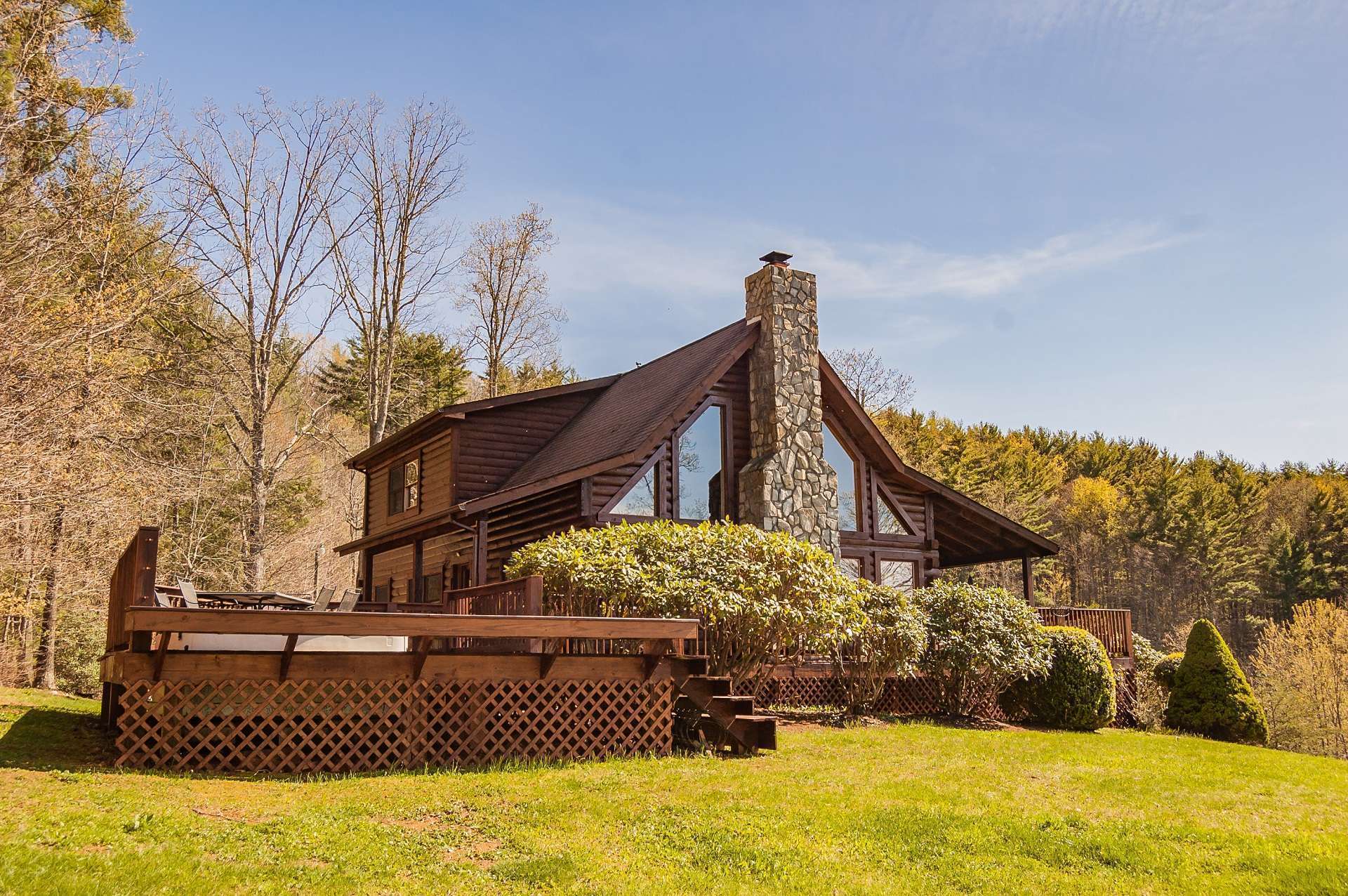 This spacious mountain log cabin with 3-bedrooms, 2-baths, bonus room, game room, & workshop is nestled among a 1.57 acre setting with plenty of space for gardens and play in a small community offering shared access to the community pond. Offered at $339,900, this cabin is ideal for your mountain retreat and has a successful vacation rental history. G107