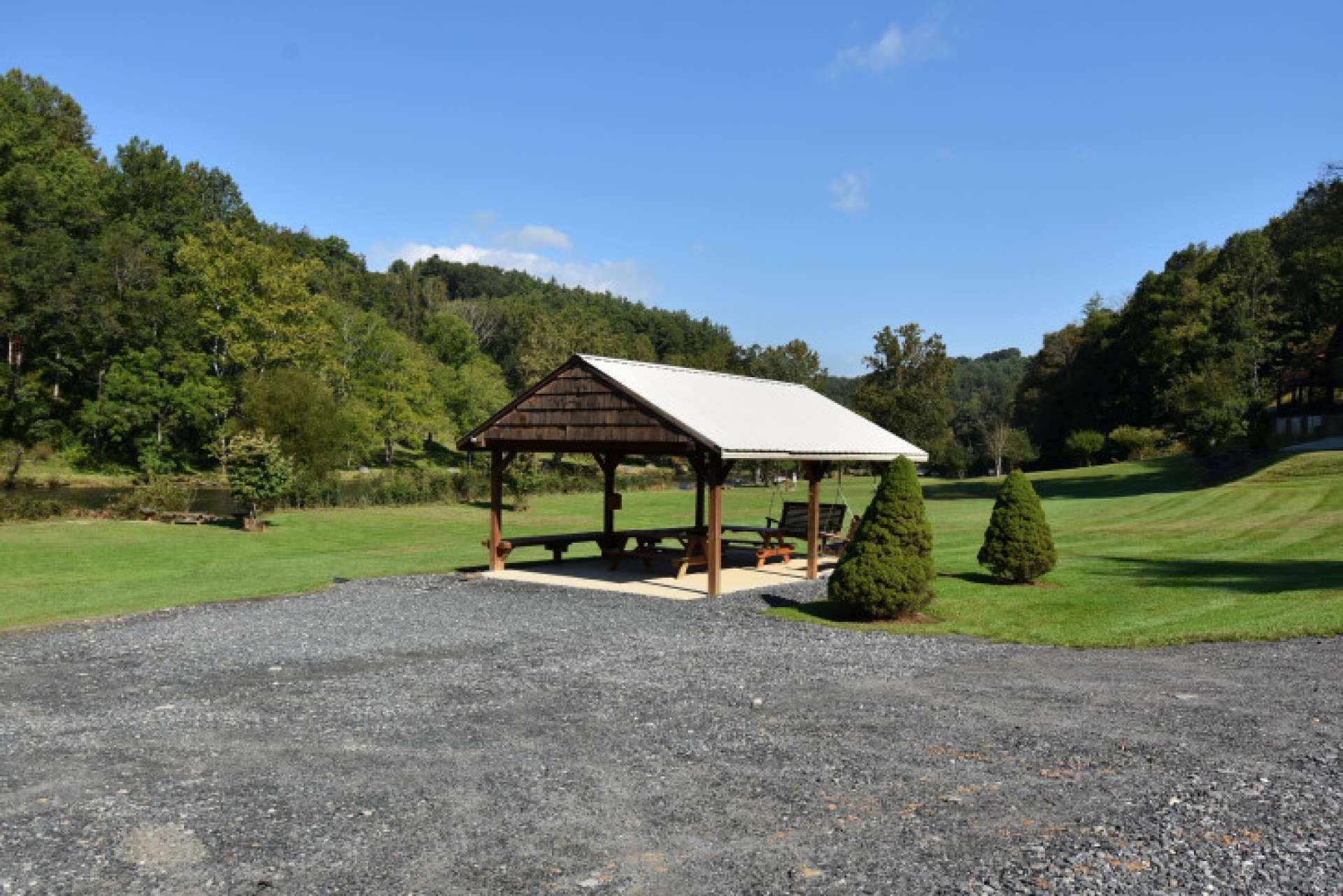 Hidden Mountain also offers a wonderful common area on the banks of the river. Enjoy a wonderful day of river activities, along with a picnic in the pavilion, or roast marshmallows and hotdogs while sharing stories around the fire pit along the river bank.