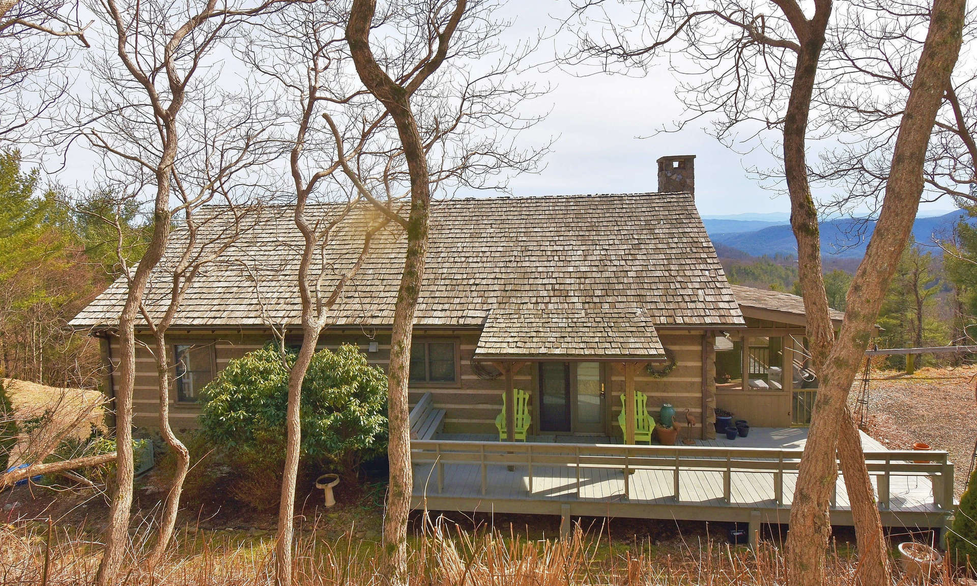 This 2-bedroom, 3-bath log cabin located just off the Blue Ridge Parkway is the ideal place to enjoy Nature's showcase of color  through all four seasons in the  NC High Country.