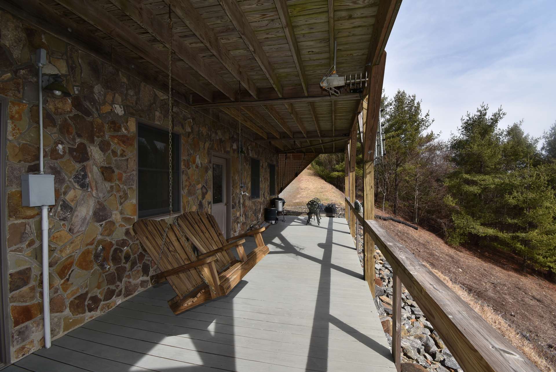 The lower level opens up to the lower patio complete with a hot tub.  You can enjoy the views from this level, too.