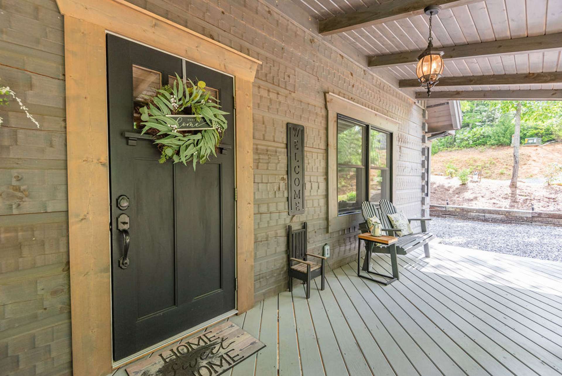 Covered front porch welcomes you and guests.