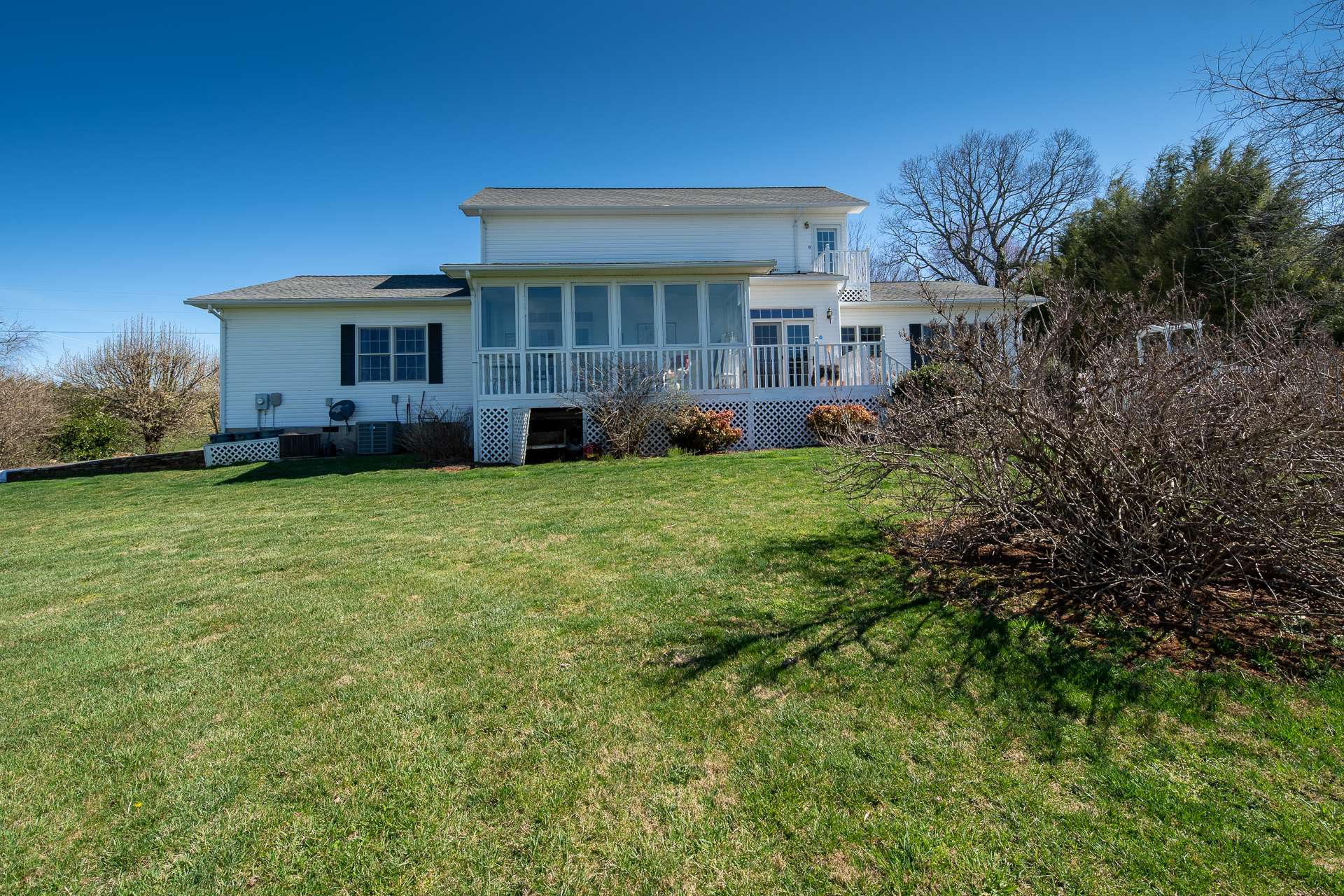 Nice yard space provides plenty of room for gardening and play.