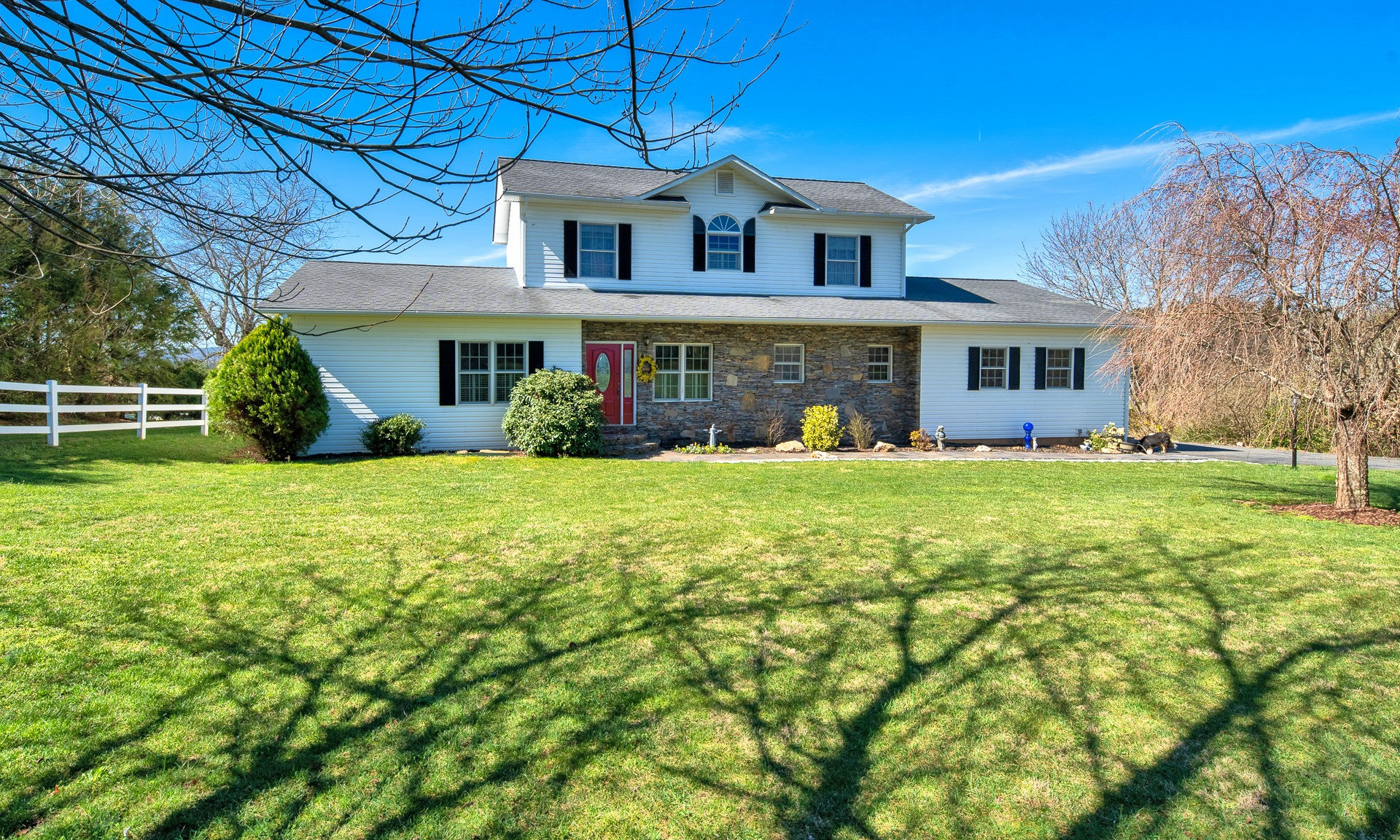 Enjoy the beauty of the NC Mountains with this well maintained home cradled in a spectacular 4+ acre setting just off the Blue Ridge Parkway.