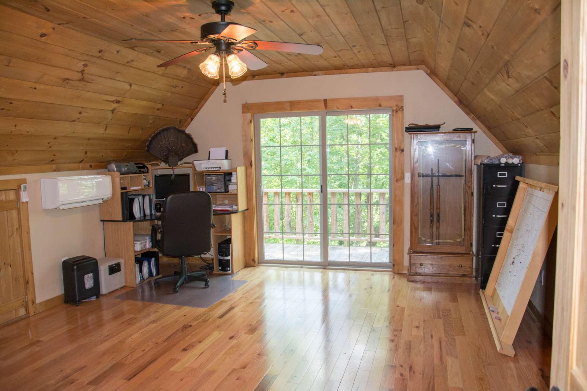 This spacious 15' x 18' bonus room with private deck is also located on the upper level offering the perfect office space or additional sleeping space. This room also has a private balcony.