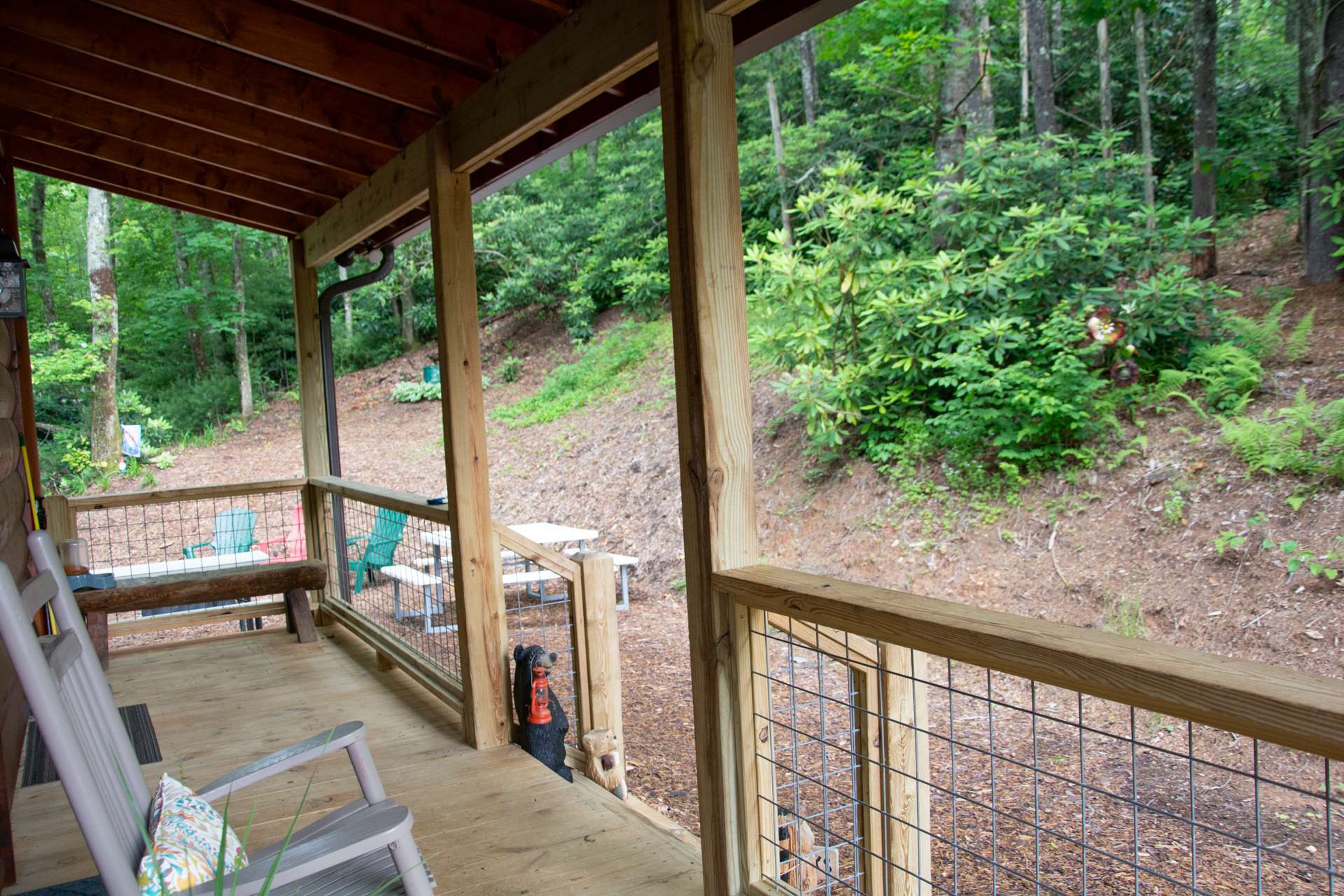 A covered front porch welcomes you home each day and provides a comfortable place to relax at the end of the day with the sounds of  the song birds and evening crickets.