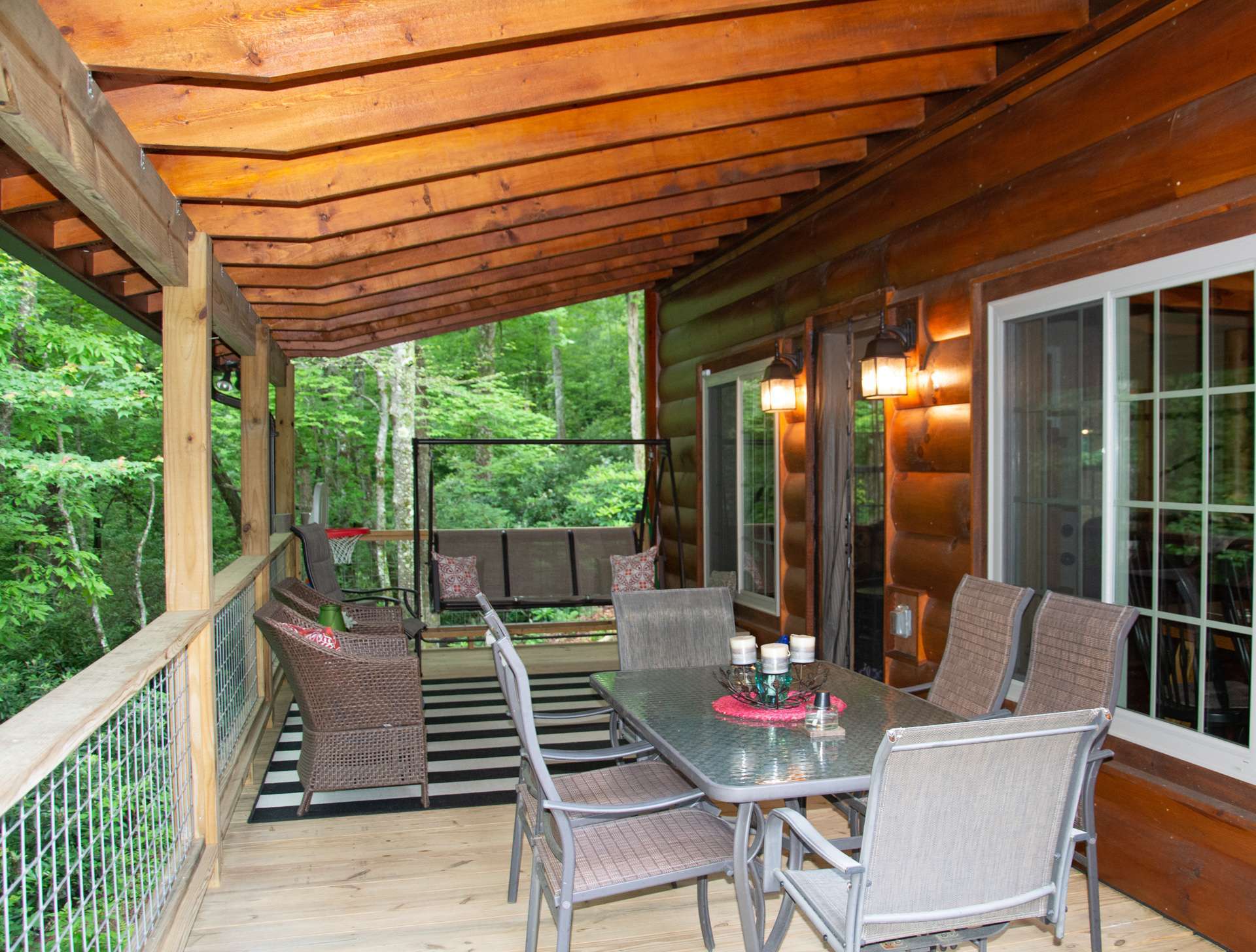 The back deck is partially covered and partially open allowing you to enjoy the great outdoors come rain or shine!