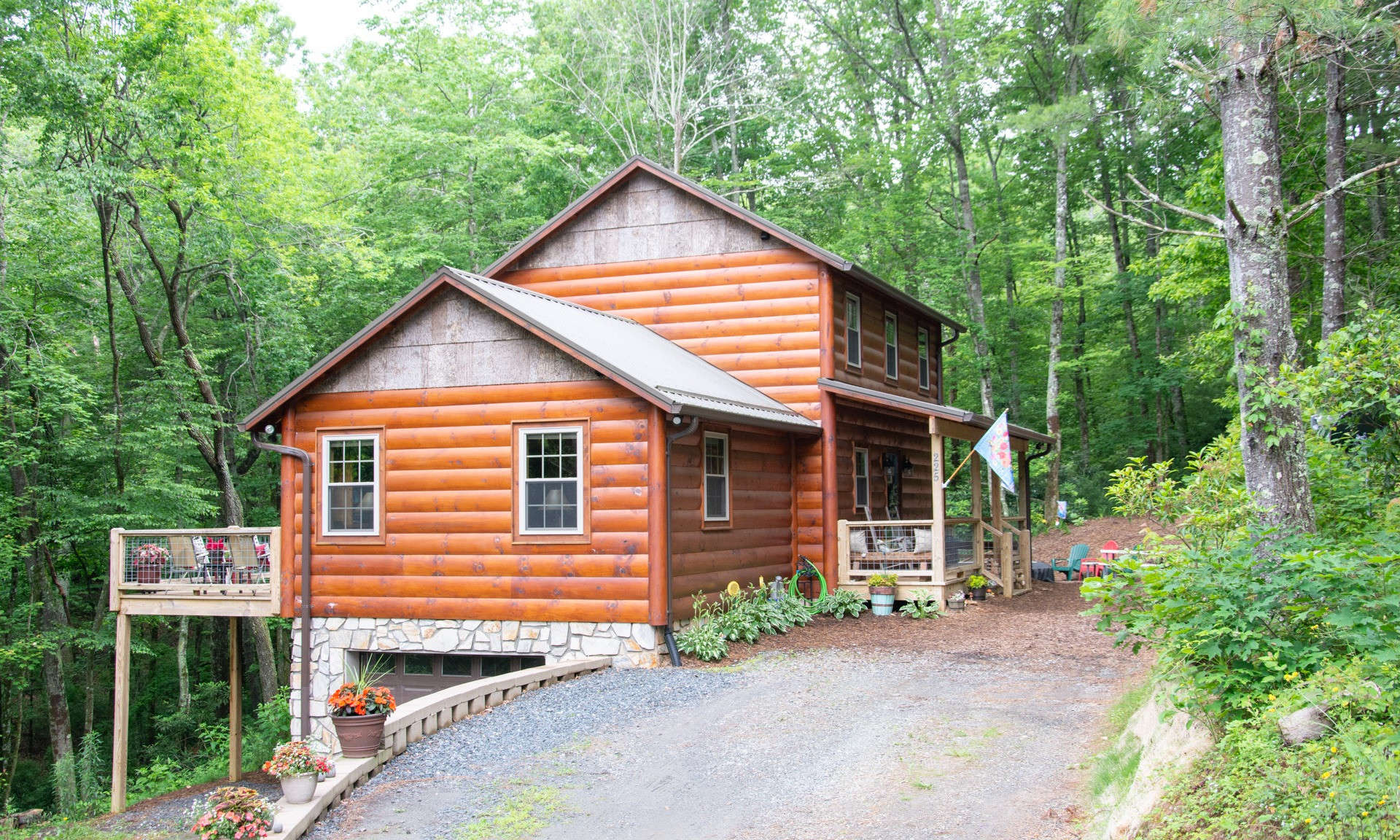 A DREAM PLEASER!  This 2-bedroom, plus loft, 3-bath log sided cabin is newly listed just in time for your summer retreats to the NC Mountains.