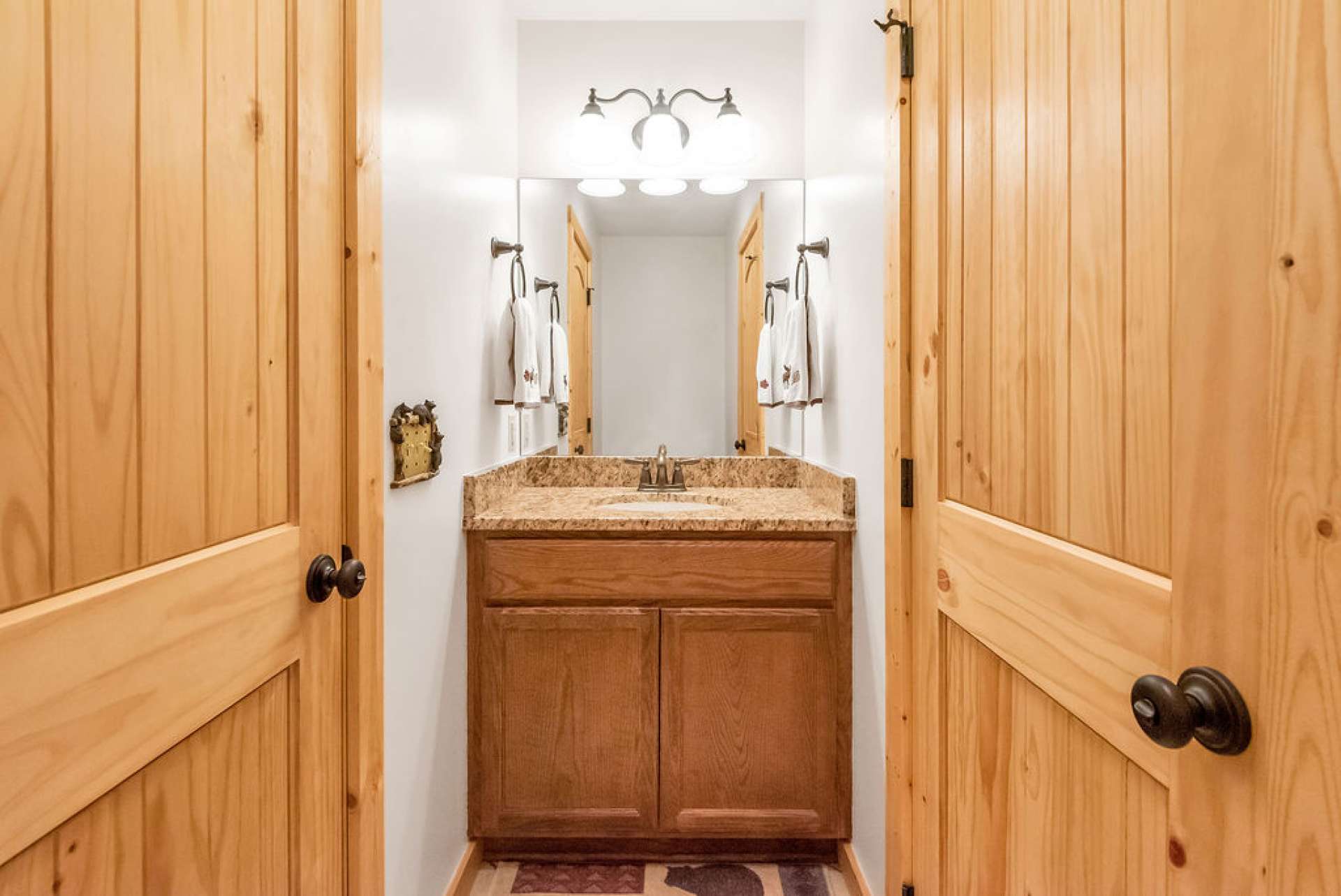 Half bath can be accessed from the laundry room or hallway.