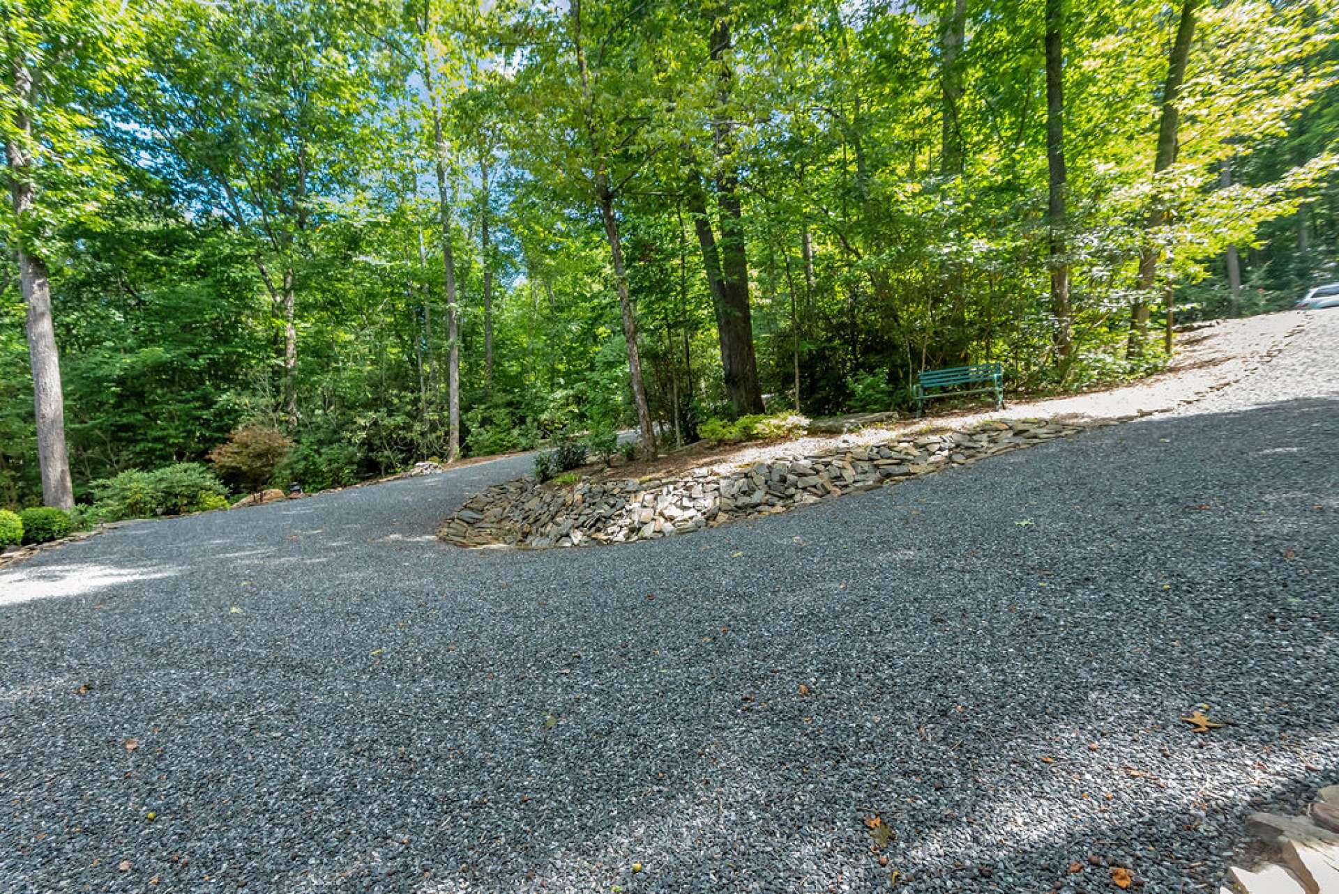 This driveway and the entire property is designed for water management and easy access.