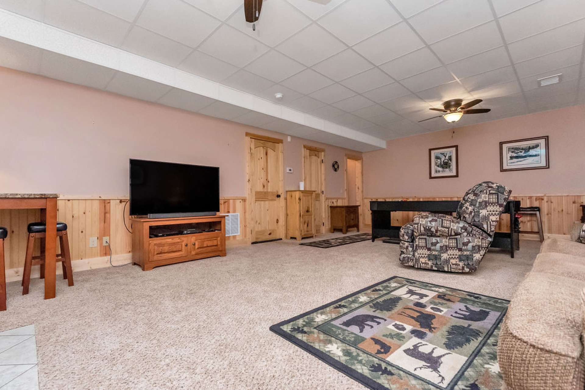 This room leads to the spacious utility room, garage, and back patio.
