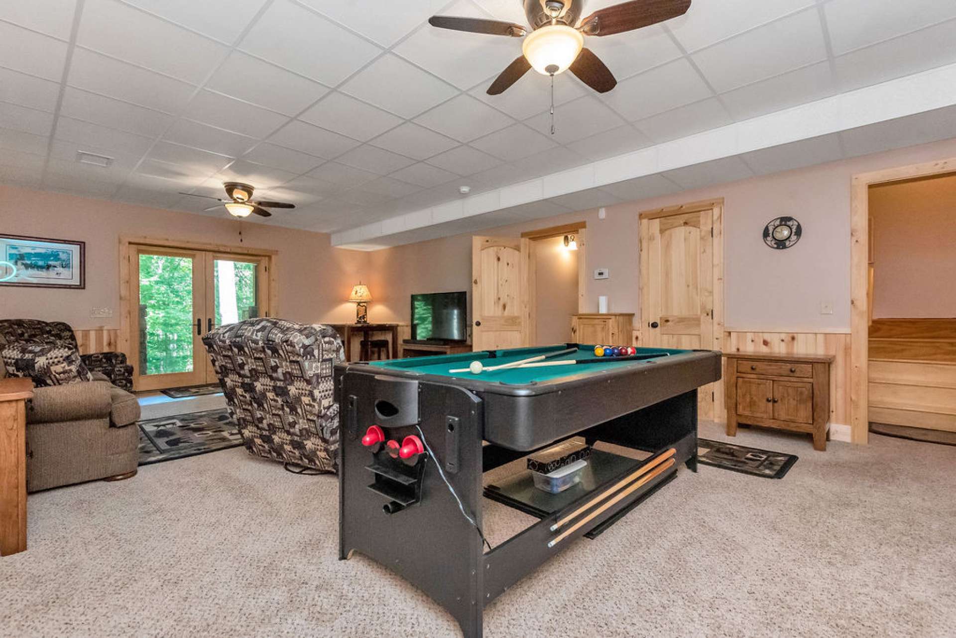 Enjoy game night in this spacious family room.