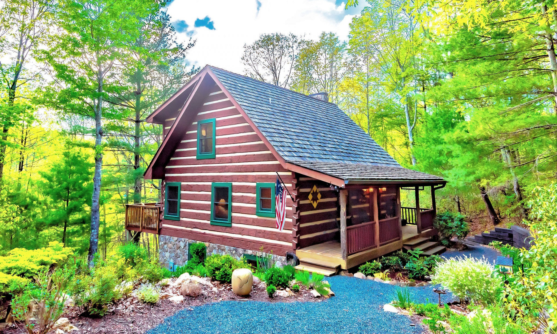 CABIN IN THE WOODS IN THE NORTH CAROLINA MOUNTAINS!  Step back into time with this 3-bedroom, 3-bath hand hewn log cabin nestled in a forest setting in the Christmas Mountain community located in the Fleetwood area of Southern Ashe County.