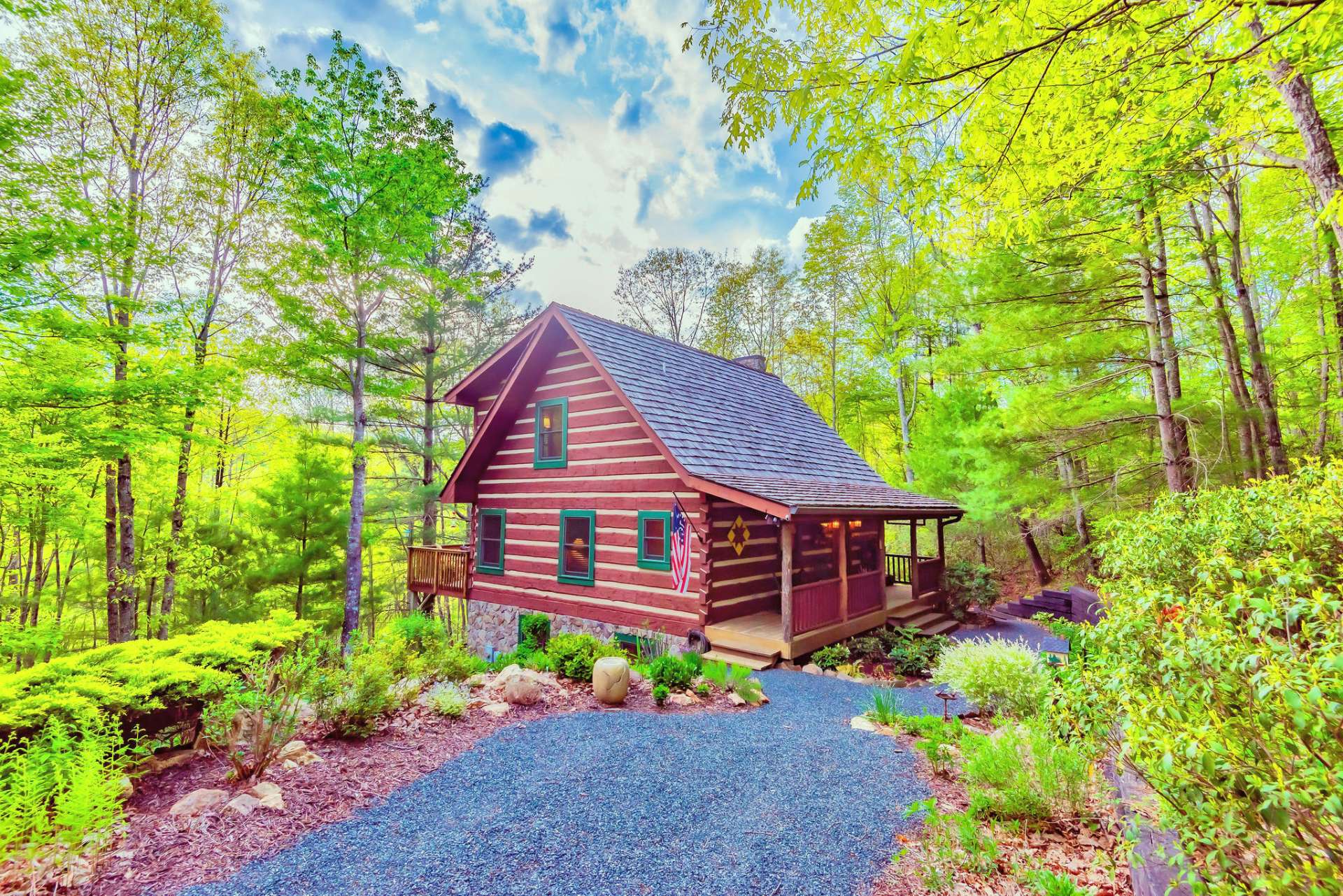 Surrounded by trees and native mountain foliage, this sweet cabin welcomes you to experience true log cabin living.