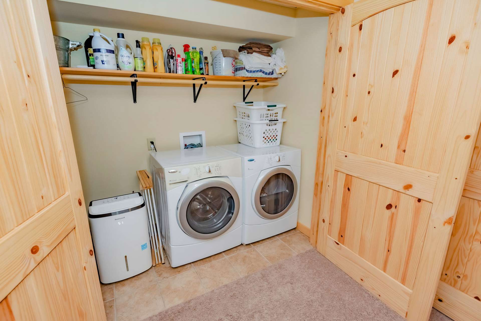A laundry space completes the lower level.