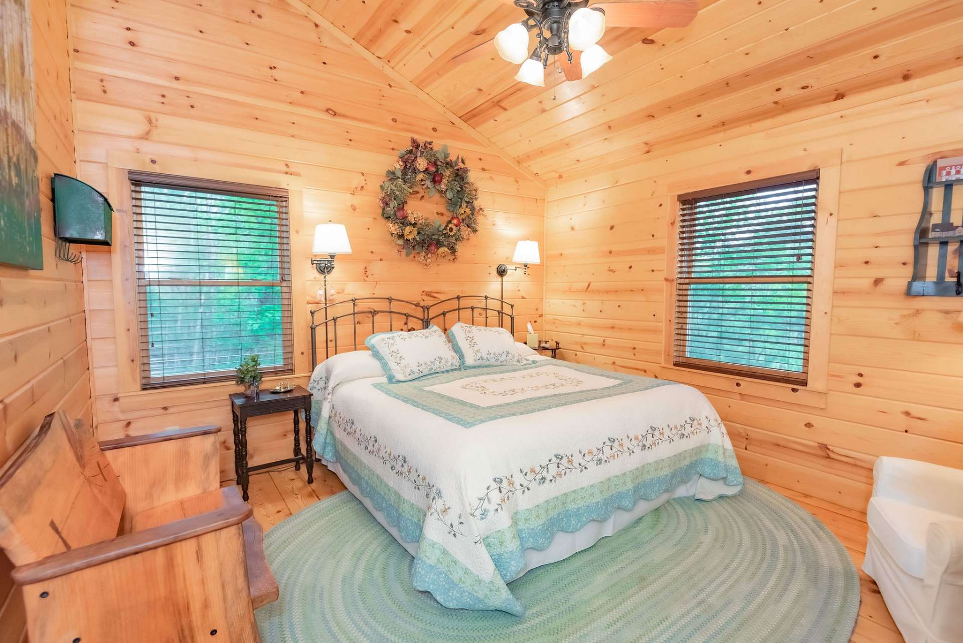 A guest bedroom, along with a full bath, is also located on the upper level.