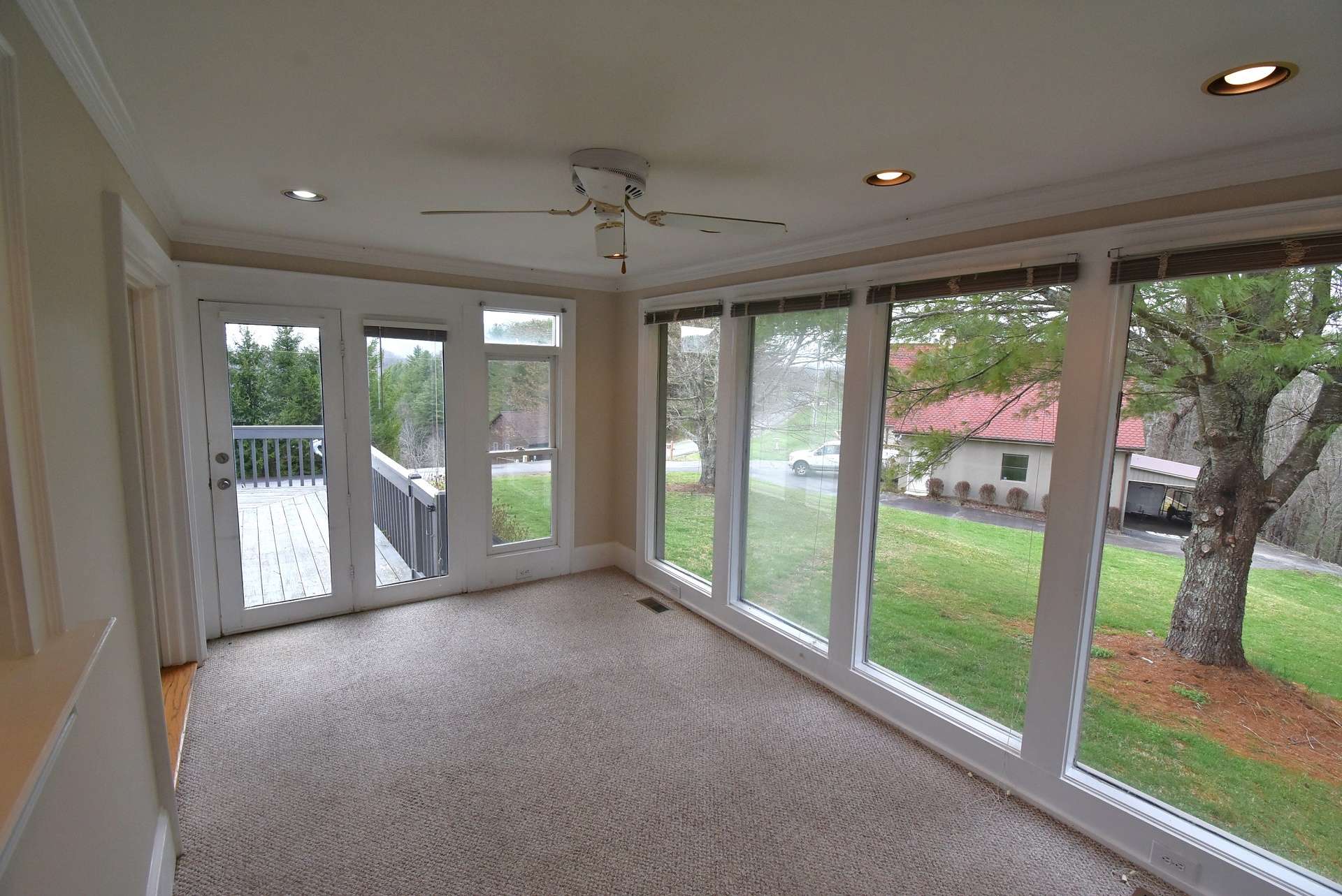 This light filled sunroom is the ideal space for plants,  play room and expands the living space.