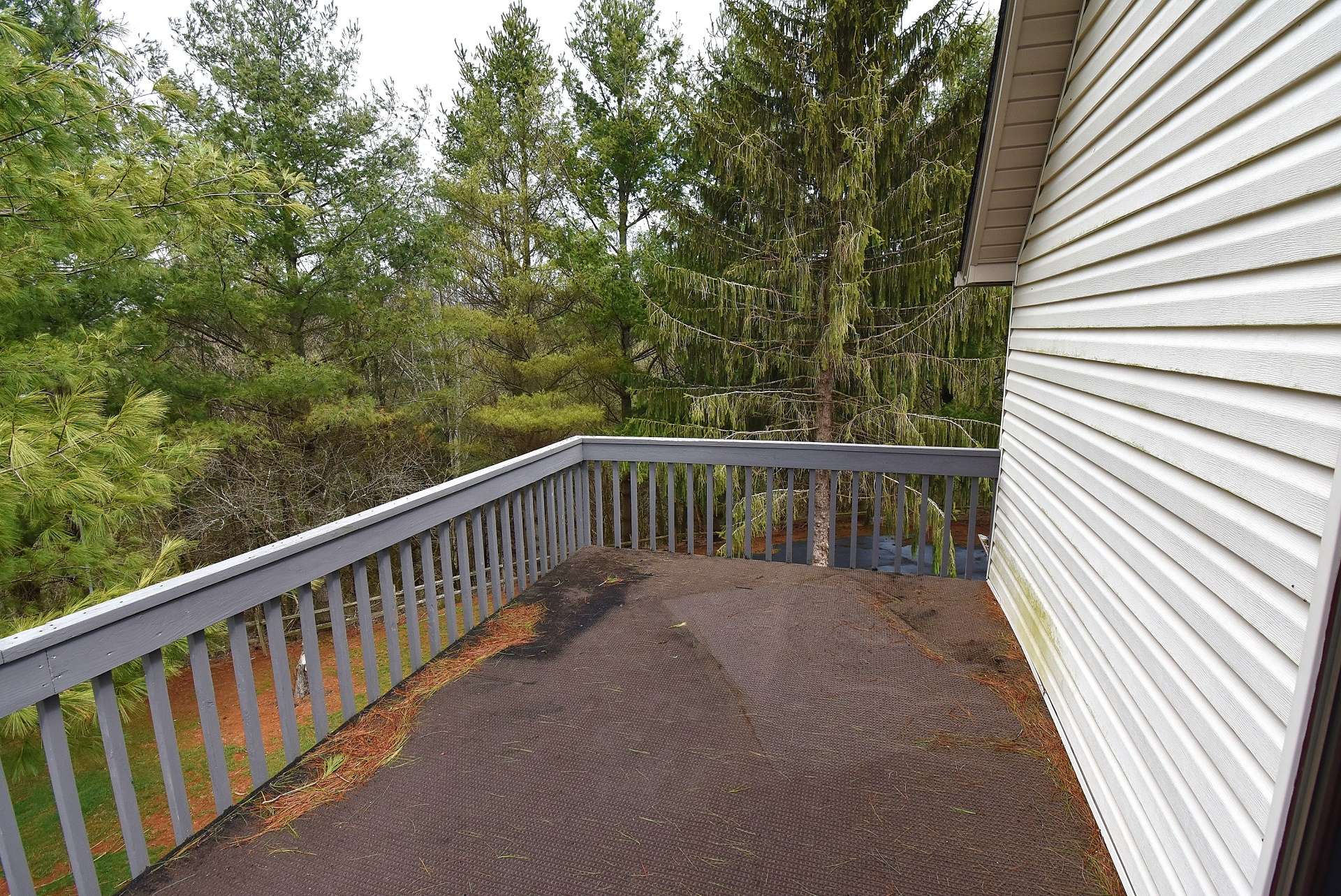 This upper level deck is accessed from the master suite.  Enjoy your morning coffee with the views and fresh mountain air, or relax in the evening with a blanket of stars above you.