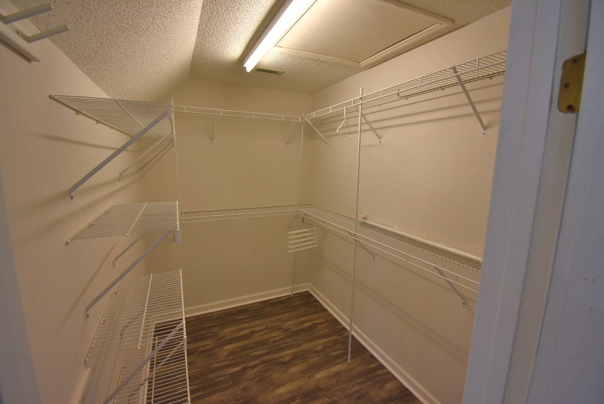 So much storage space in the master bedroom closet.