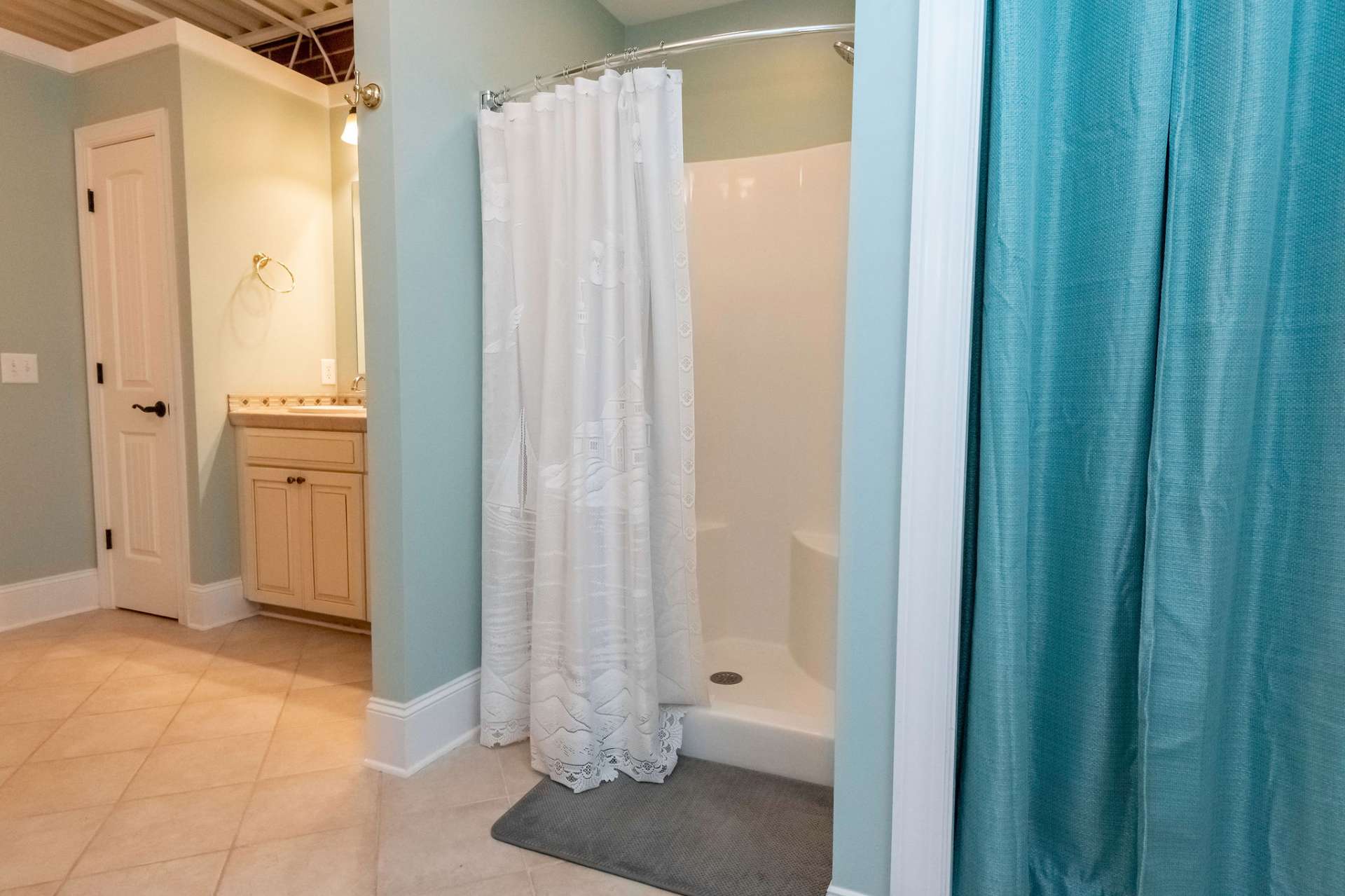 Equipped with a soaking tub shower and double sinks, as well!
