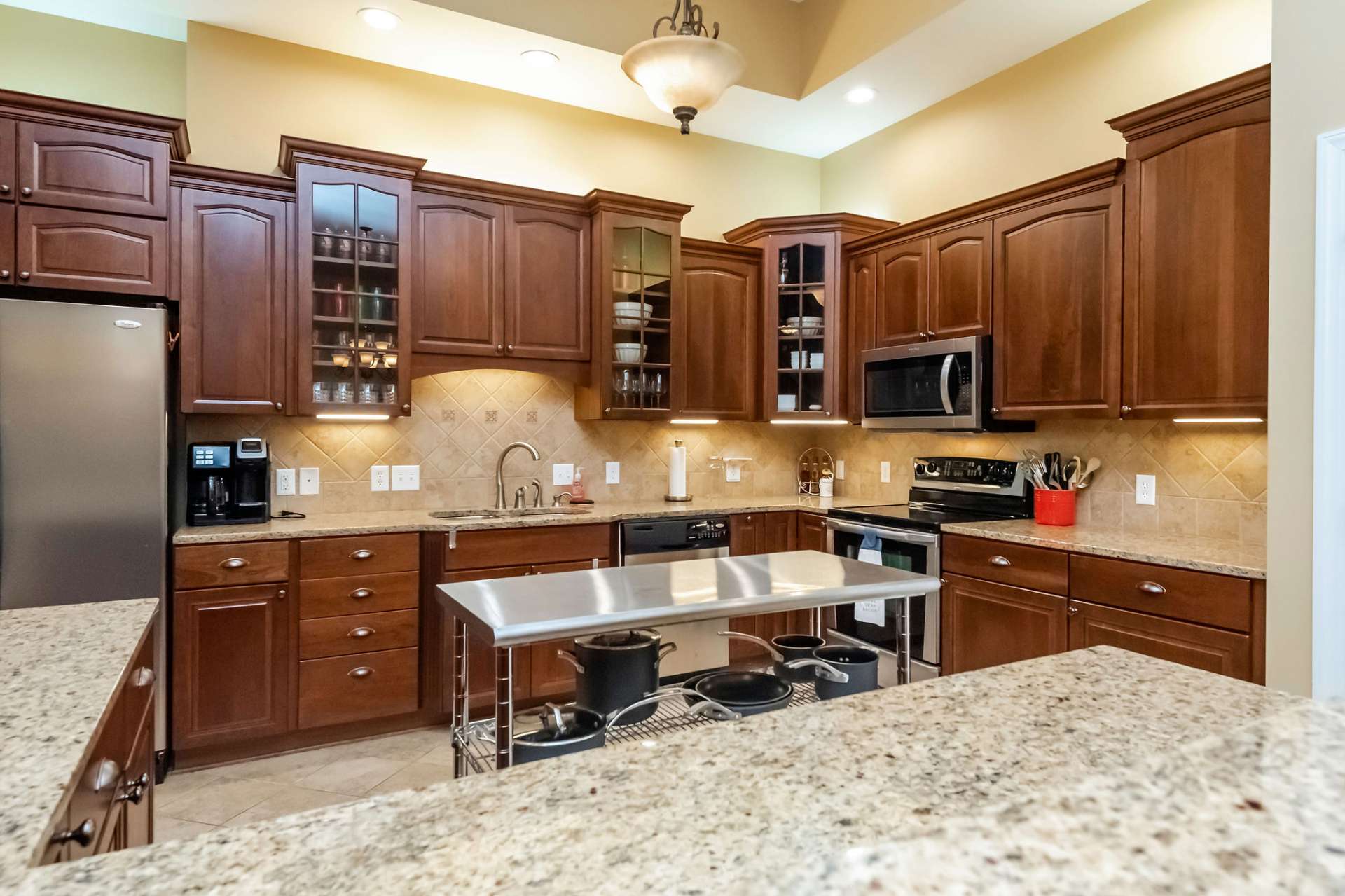 Ample cabinet space with these beautiful self-closing American Woodmark cabinets.