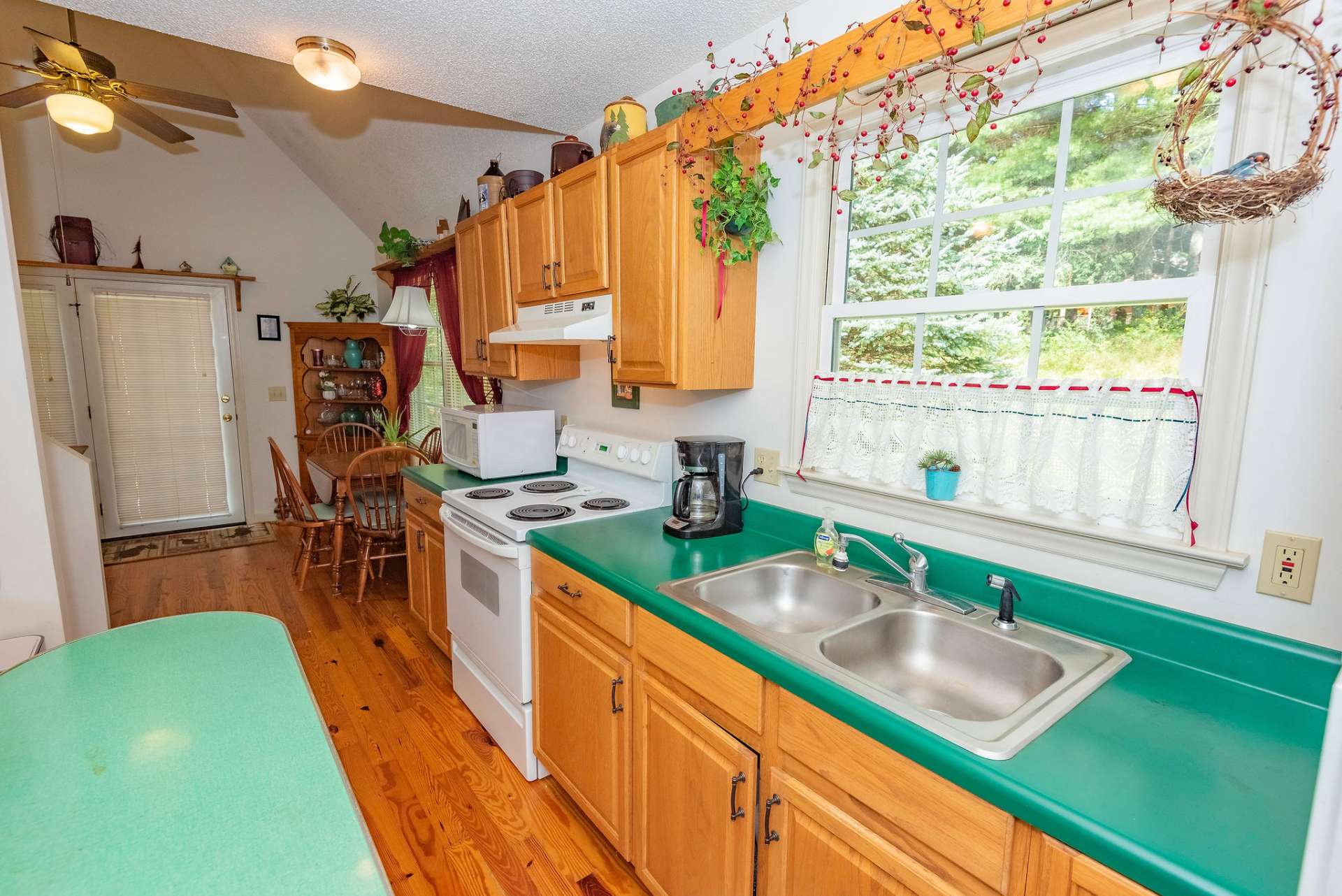 A view from the kitchen door looking into the dining area