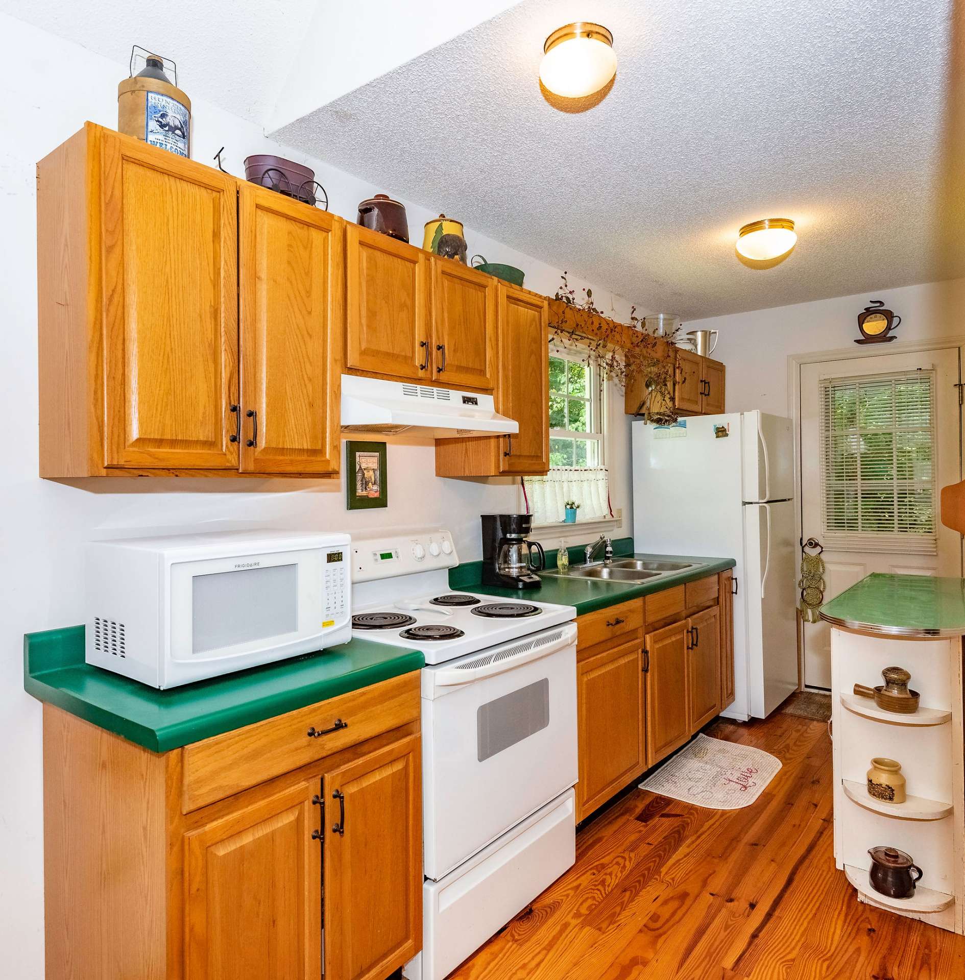 Bright galley kitchen with plenty of storage