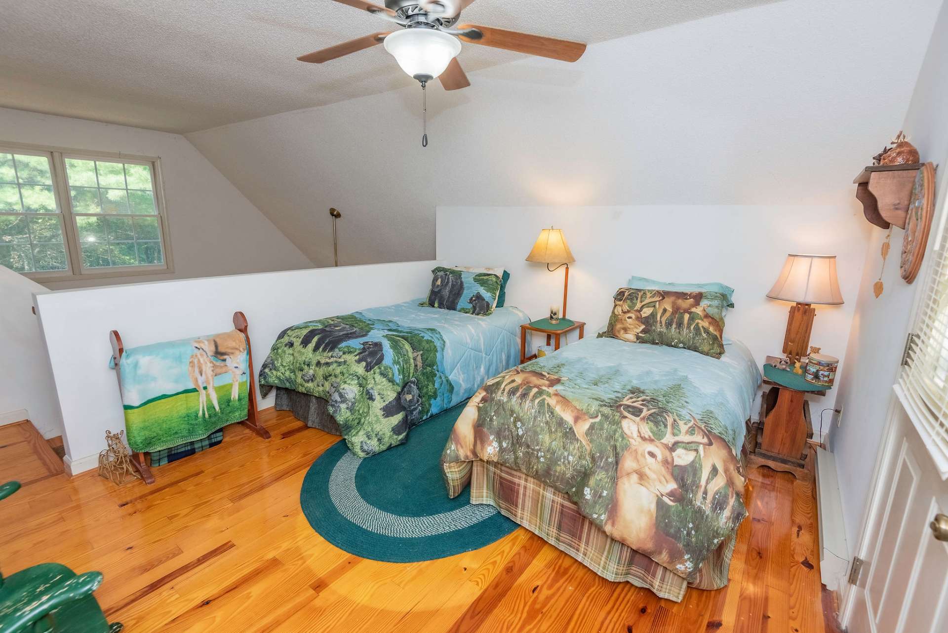 Second floor bedroom with the door leading to a balcony. (This room could be turned back into a loft)