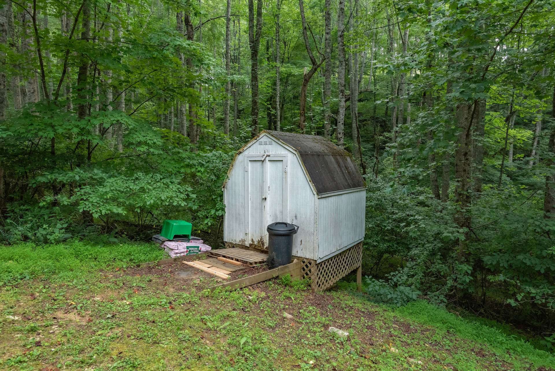 There is an outbuilding that will be great for storing your lawn and garden equipment.