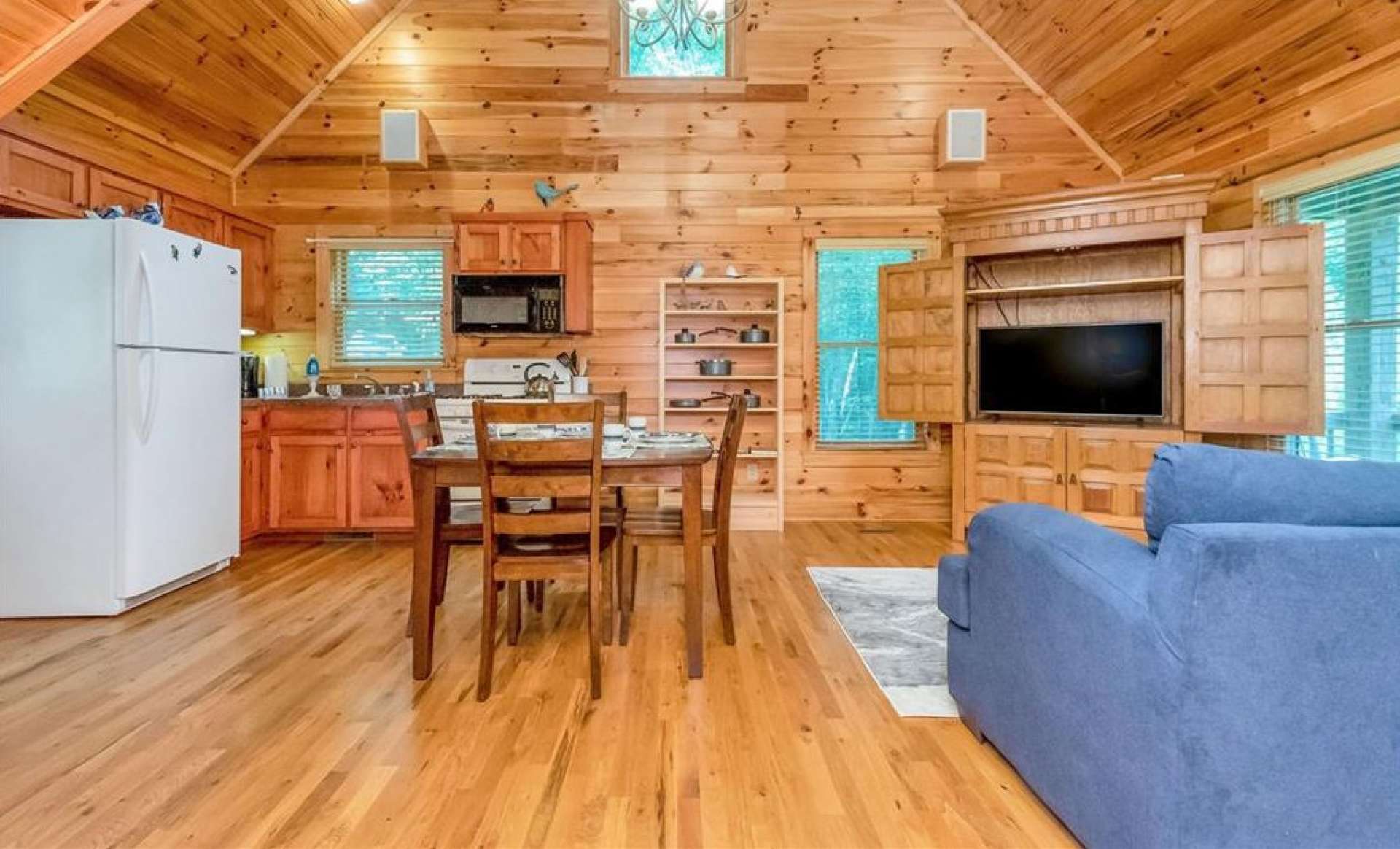 You'll feel the cabin vibe with tongue and grove ceilings and hard wood floors throughout.